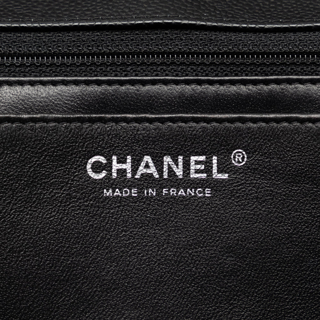 Chanel Classic Double Flap Maxi Black Caviar Gold