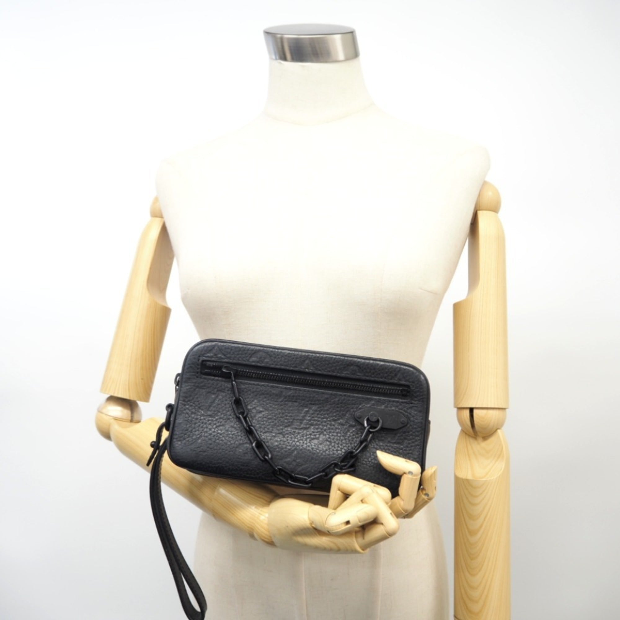 Louis Vuitton Volga  Leather Clutch Bag ()