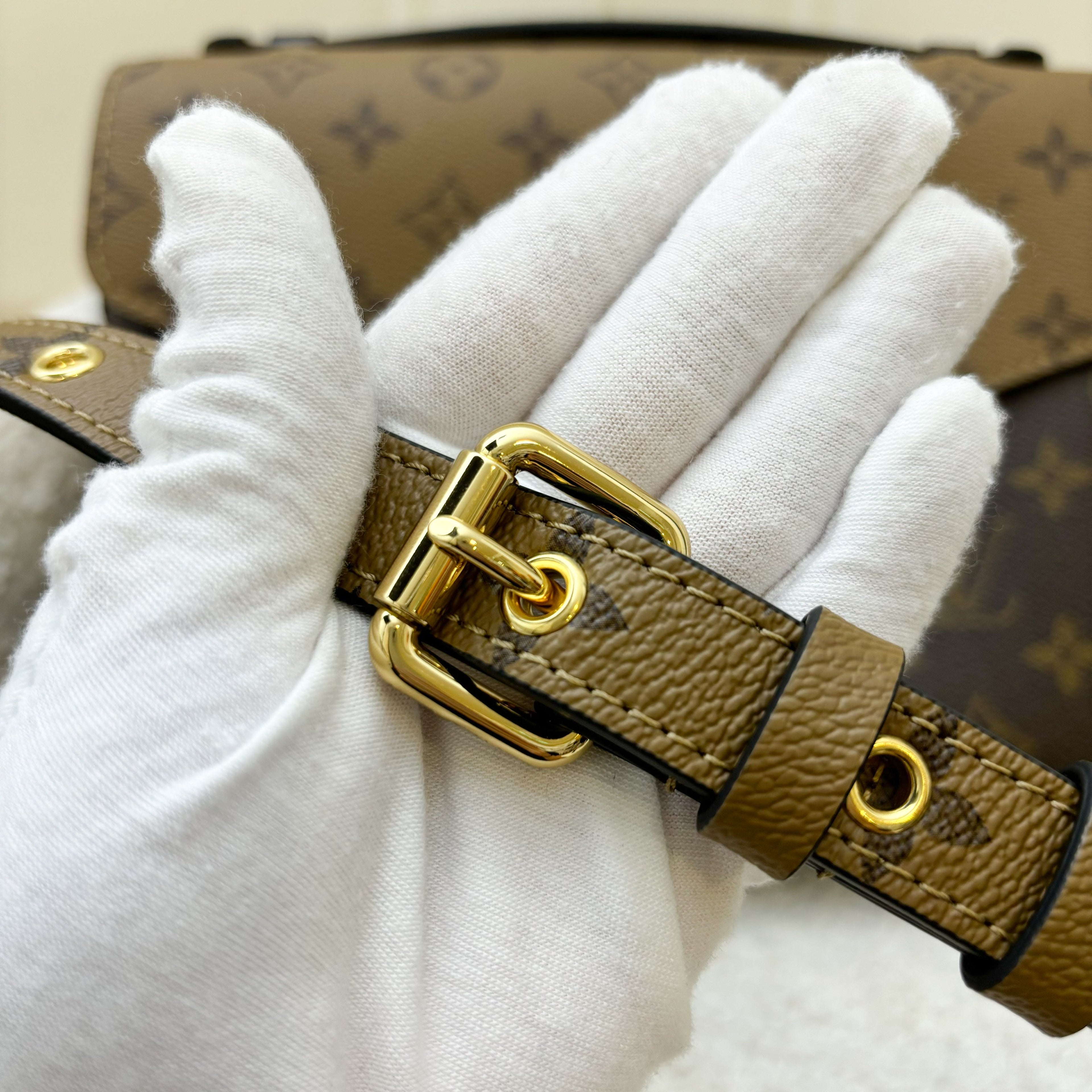 LV Pochette Metis in Reverse Monogram Canvas, Black Leather and GHW