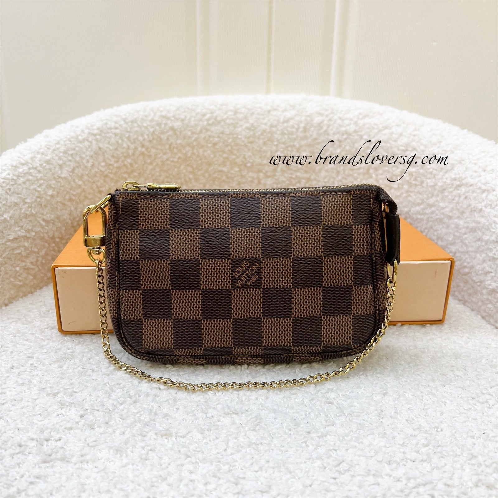 LV Mini Pochette Accessoires in Damier Ebene Canvas GHW