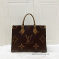 LV Onthego MM in Reverse Giant Monogram Canvas and GHW