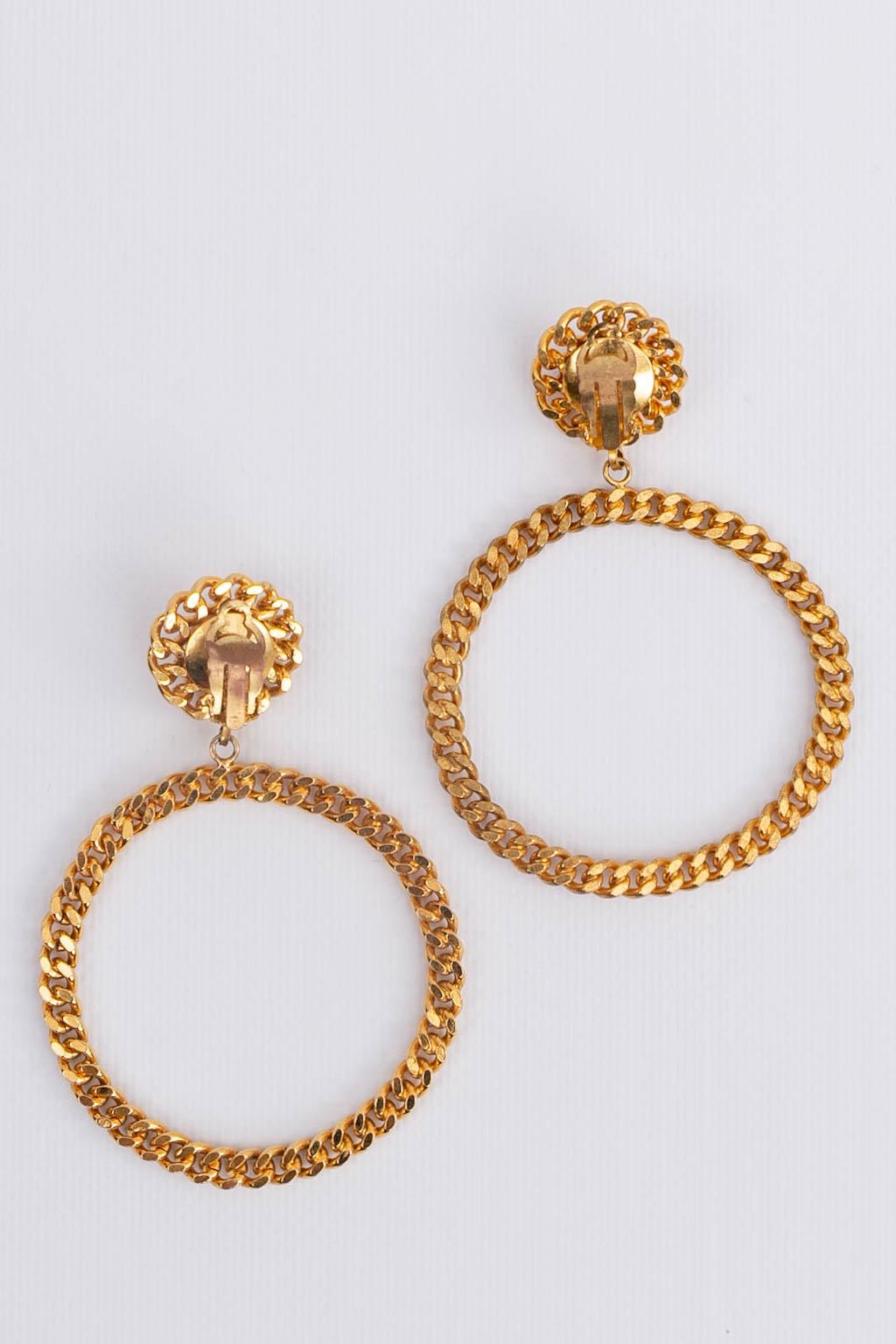 Boucles d'oreilles dorées Chanel