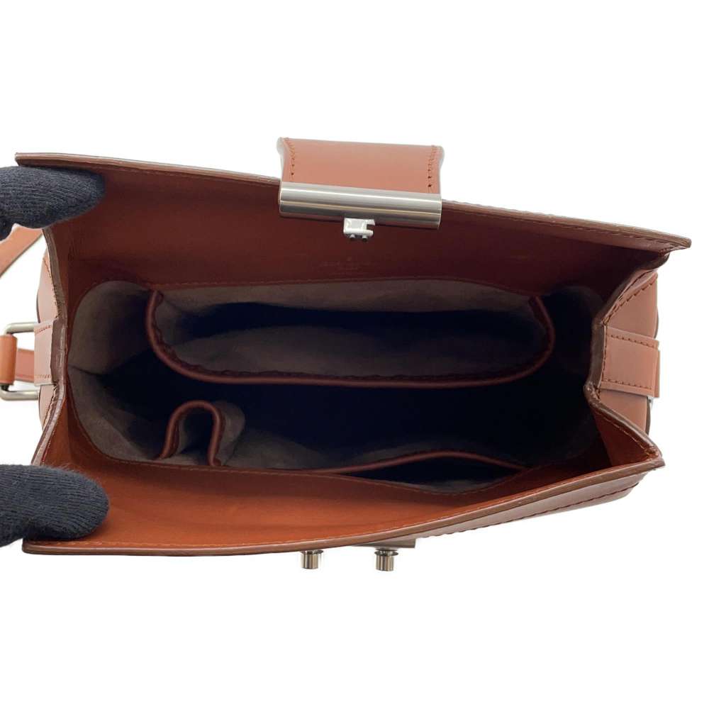 LOUIS VUITTON Nomade Porto Gemmells Brown Nomade・Leather