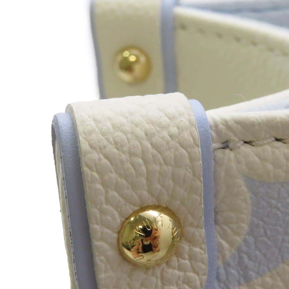 LOUIS VUITTON Onthego Latte White/Candy Blue M46833 Bicolor Monogram Empreinte Leather Size PM