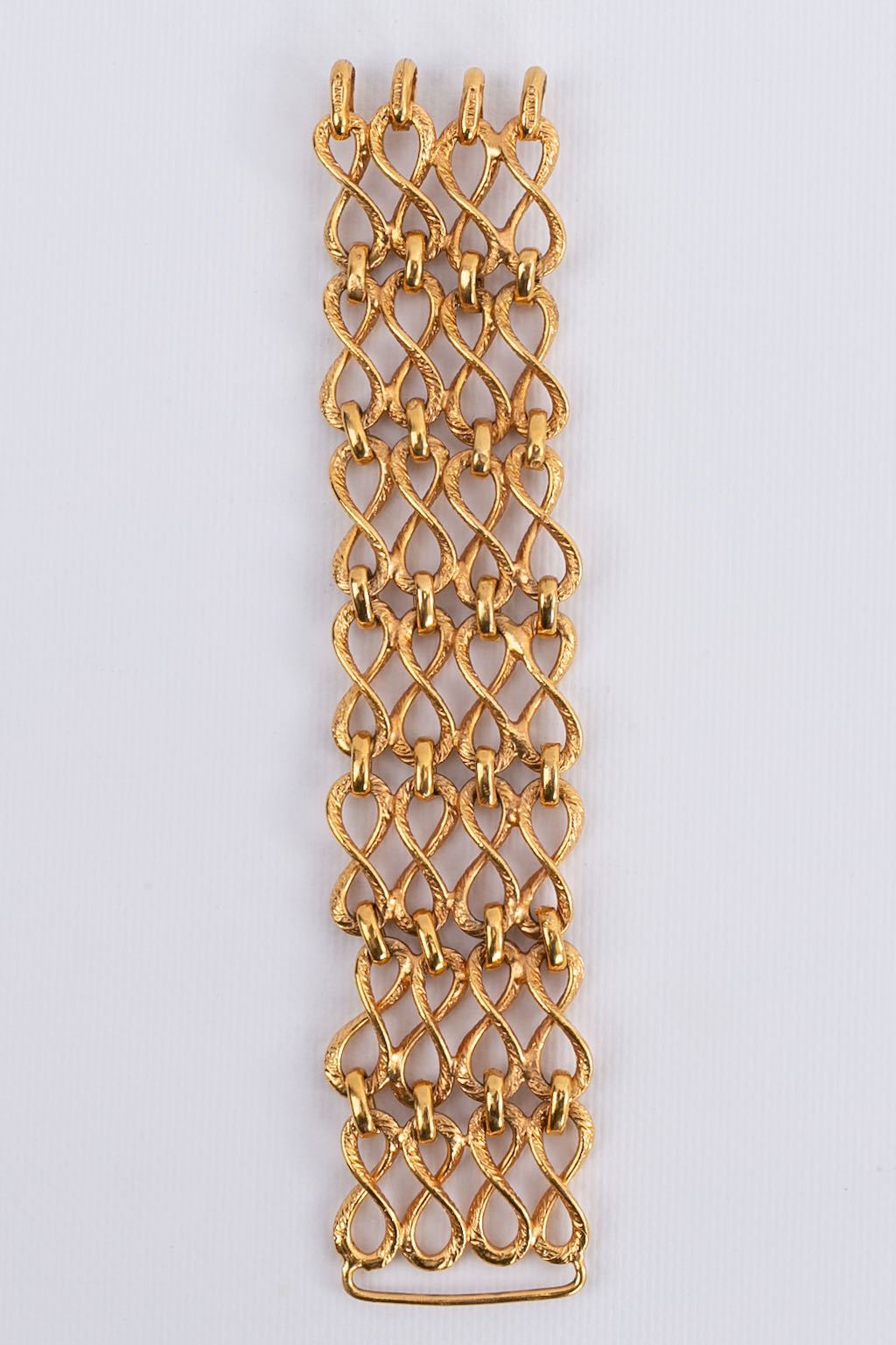 Bracelet articulÃƒÆ’Ã‚Â© en mÃƒÆ’Ã‚Â©tal dorÃƒÆ’Ã‚Â© Chanel