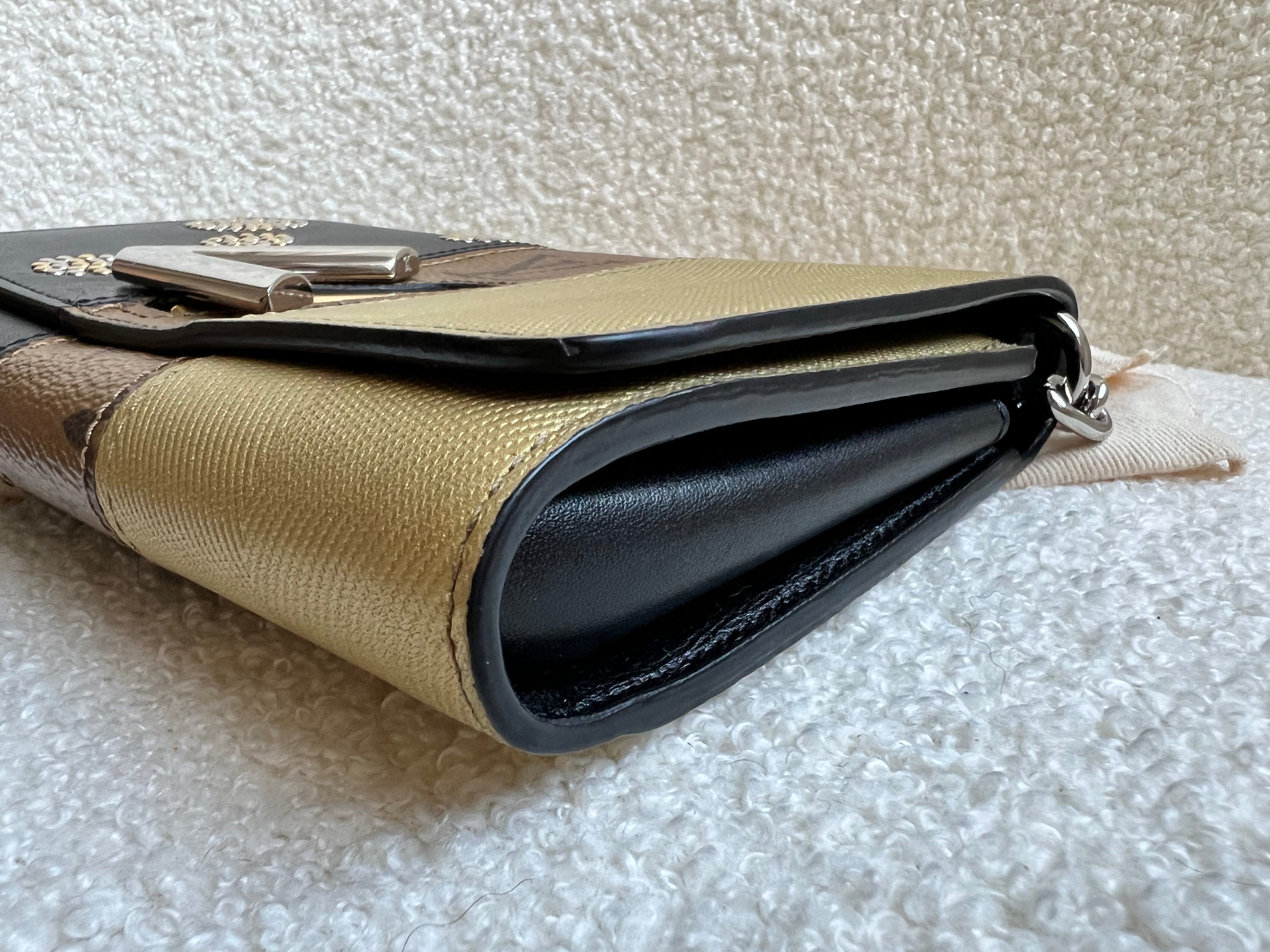 Louis Vuitton Reverse Monogram Studded Twist Chain Wallet