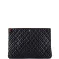 CHANEL O Case Clutch Quilted Lambskin Large