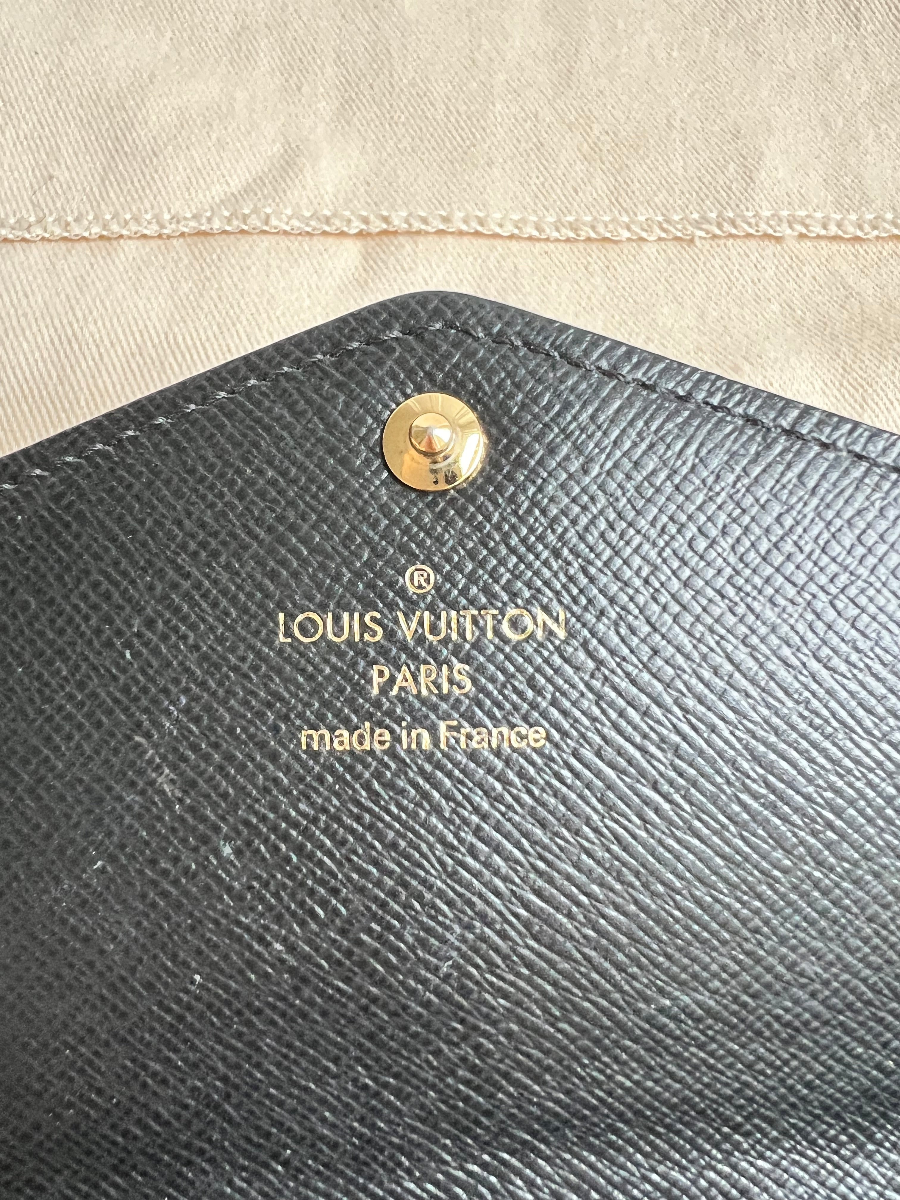 Louis Vuitton Sarah Wallet in reverse Monogram and Brown (RRP £550)
