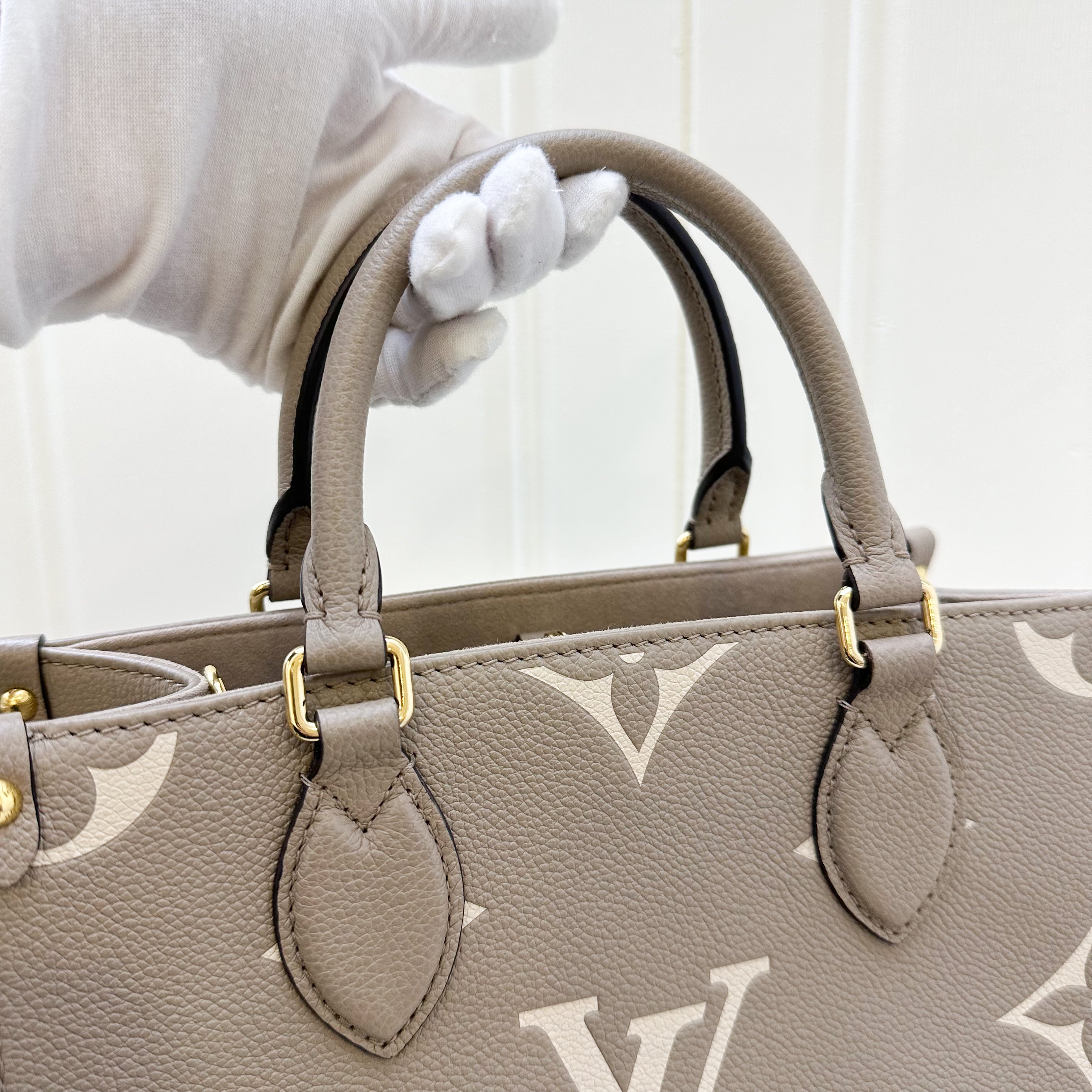 LV Onthego PM in Tourterelle (Grey) / Creme Giant Monogram Empreinte Leather and GHW