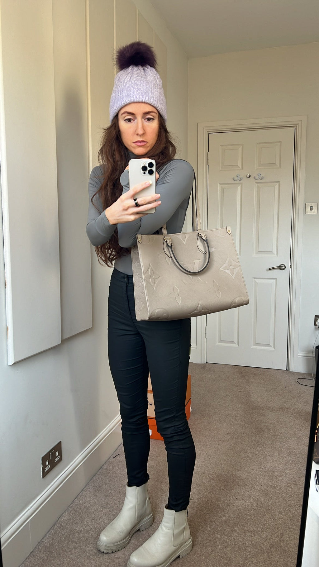 Louis Vuitton On the Go MM Dune Empreinte (RRP £2,480)