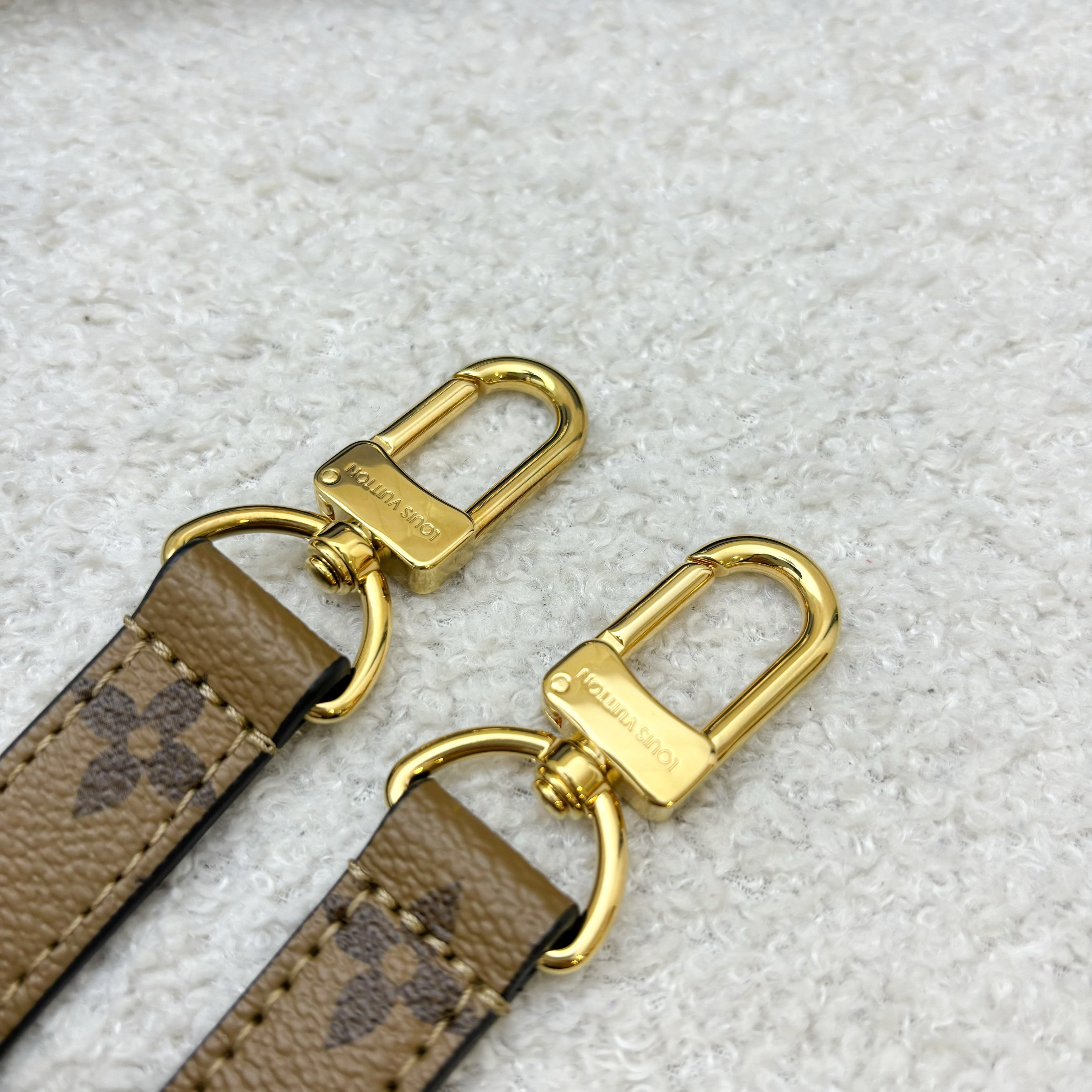 LV Pochette Metis in Reverse Monogram Canvas, Black Leather and GHW