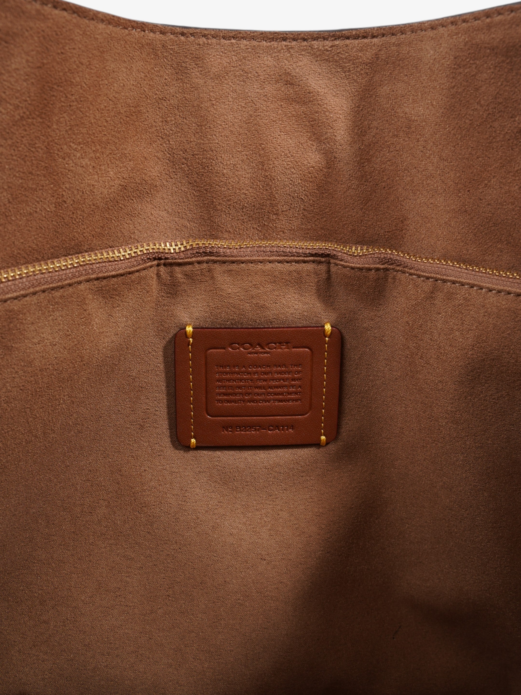Coach Theo Cream Leather