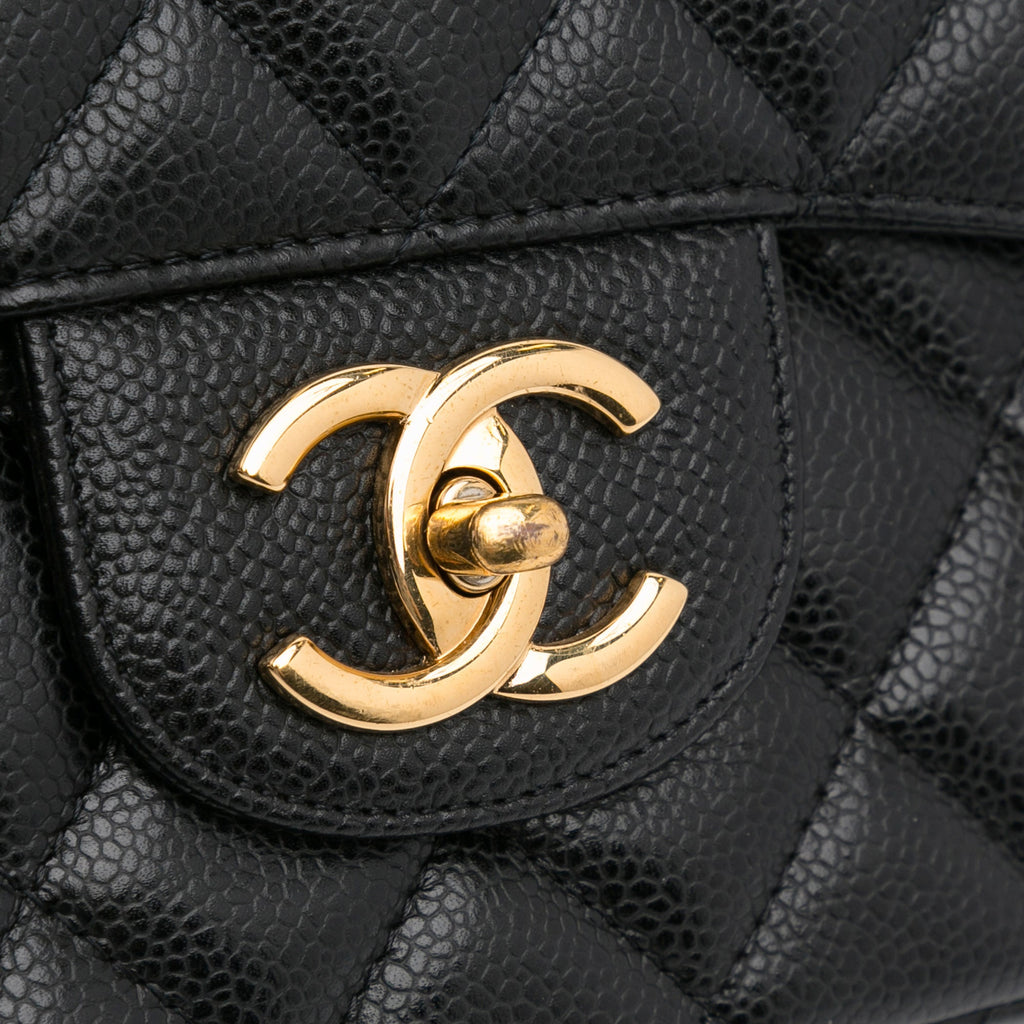 Chanel Classic Double Flap Maxi Black Caviar Gold