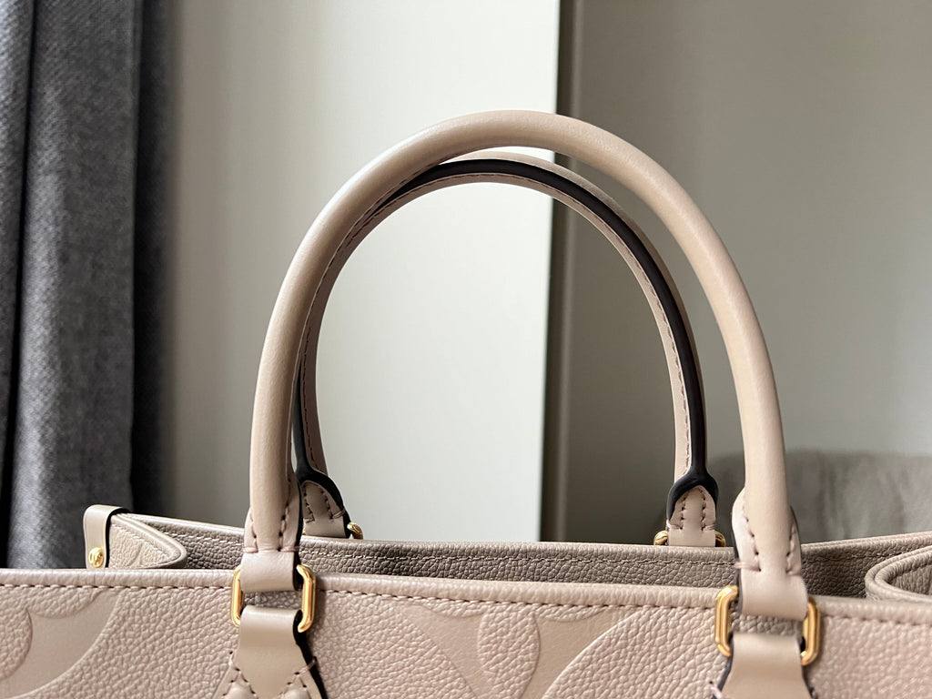 Louis Vuitton On the Go MM Dune Empreinte (RRP £2,480)