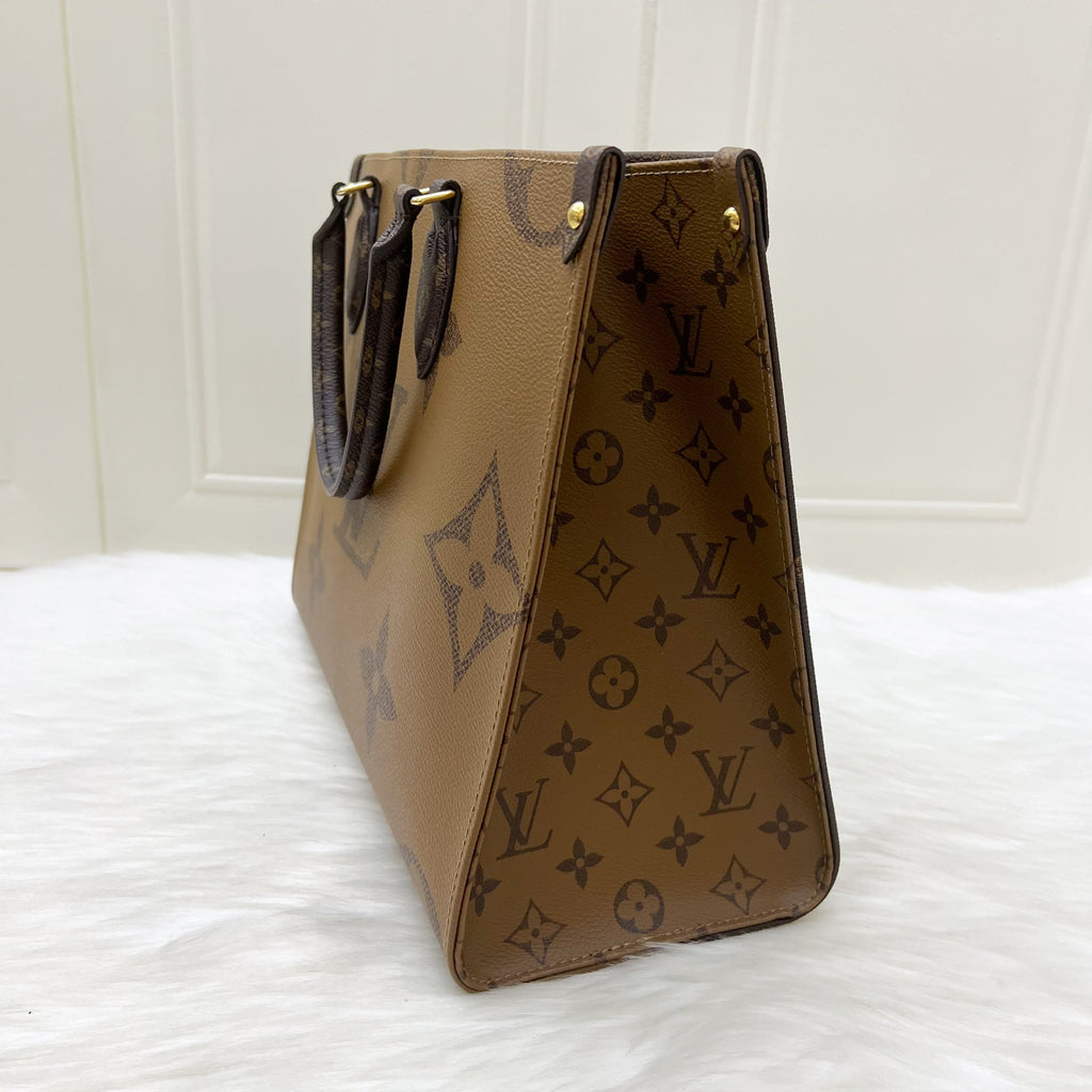 LV Onthego MM in Reverse Giant Monogram Canvas and GHW