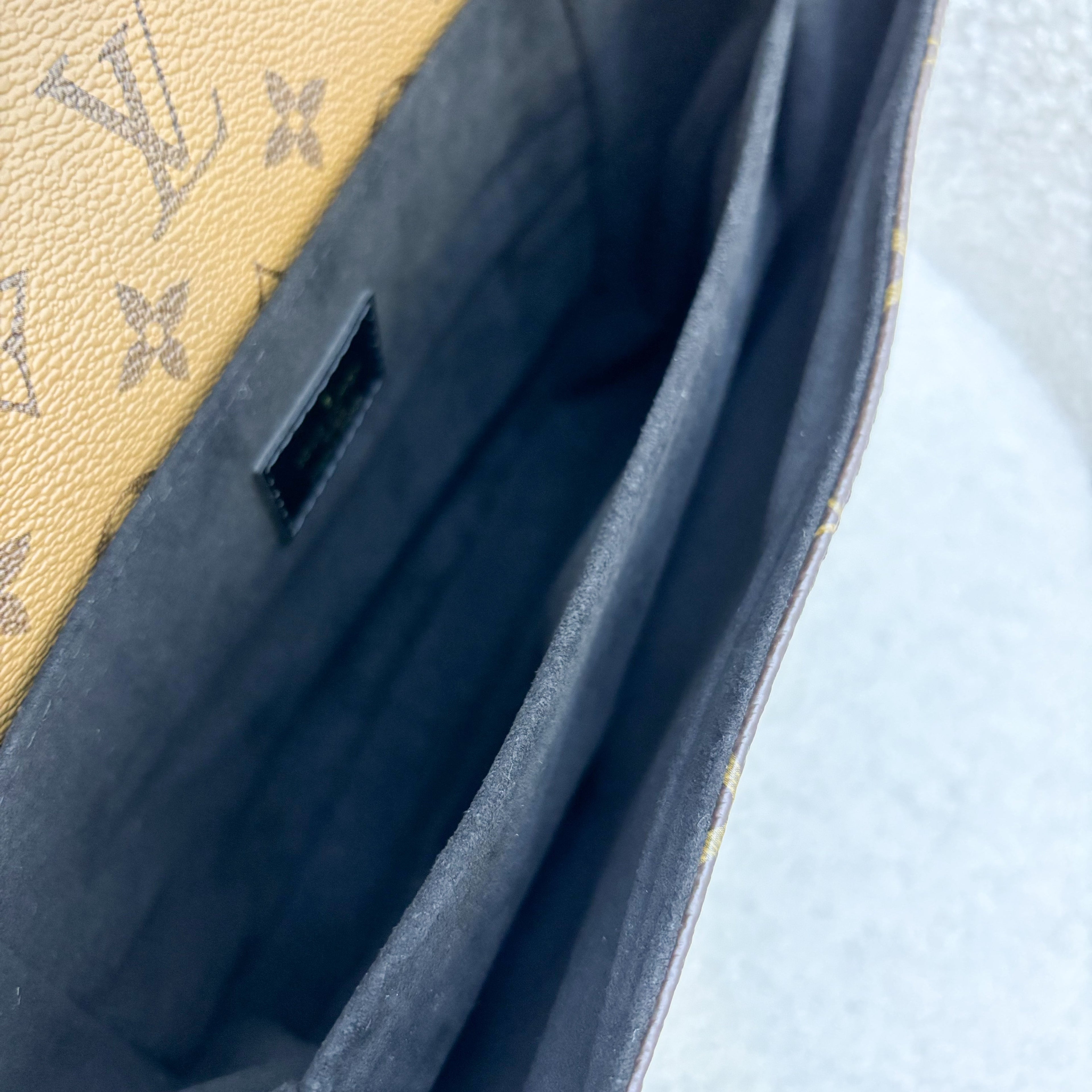 LV Pochette Metis in Reverse Monogram Canvas, Black Leather and GHW