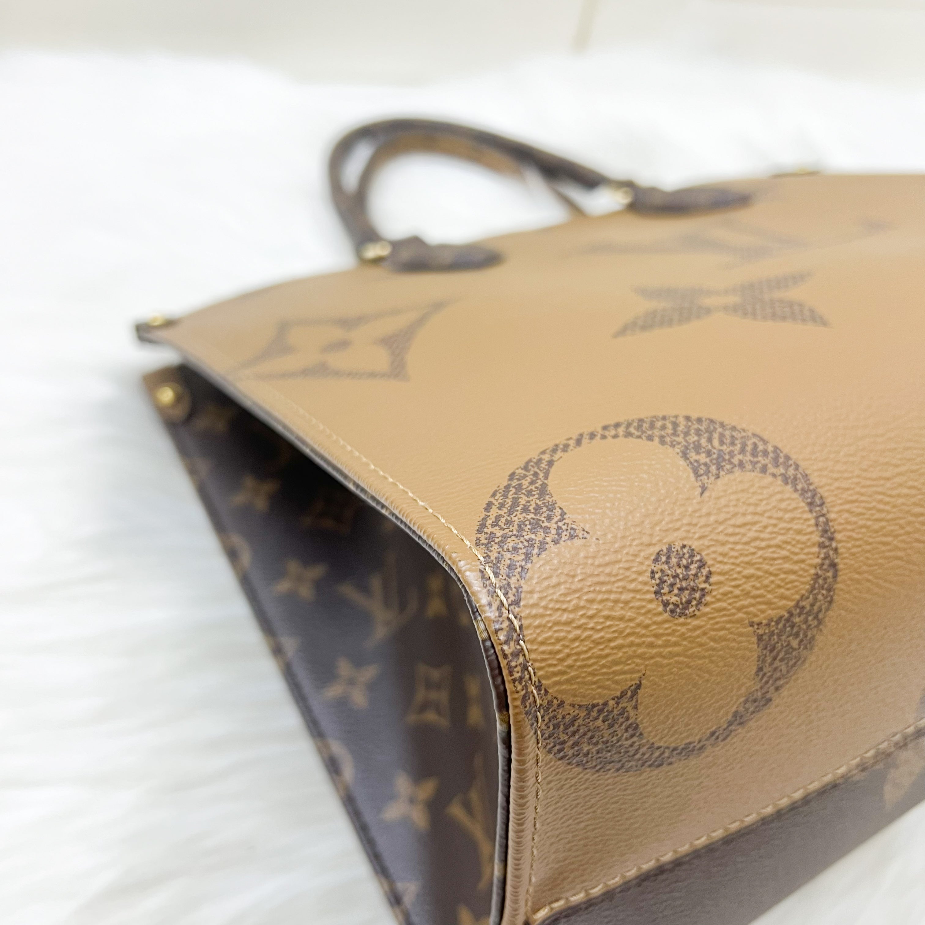 LV Onthego MM in Reverse Giant Monogram Canvas and GHW