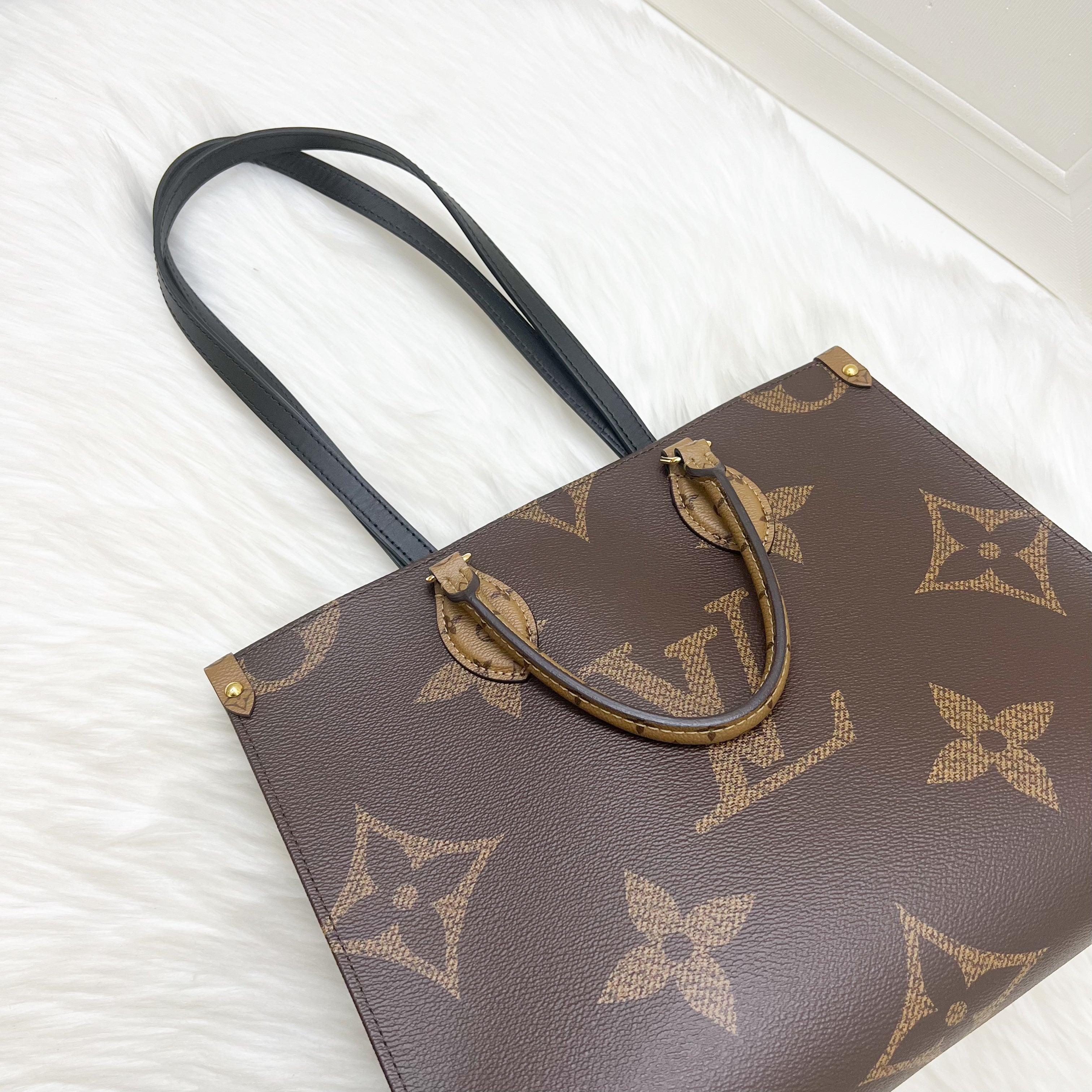 LV Onthego MM in Reverse Giant Monogram Canvas and GHW