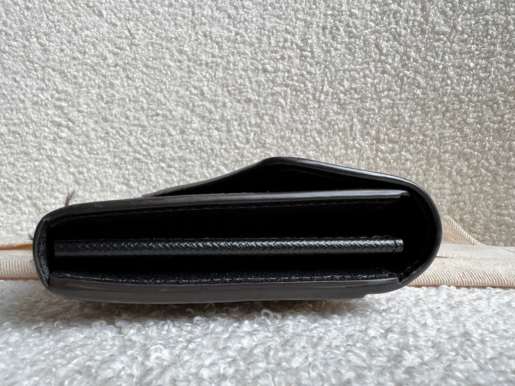 Louis Vuitton Sarah Wallet in reverse Monogram and Brown (RRP £550)