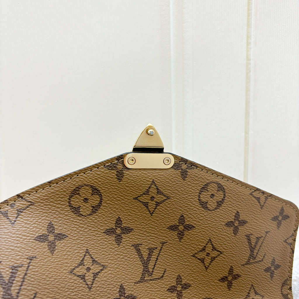 LV Pochette Metis in Reverse Monogram Canvas, Black Leather and GHW