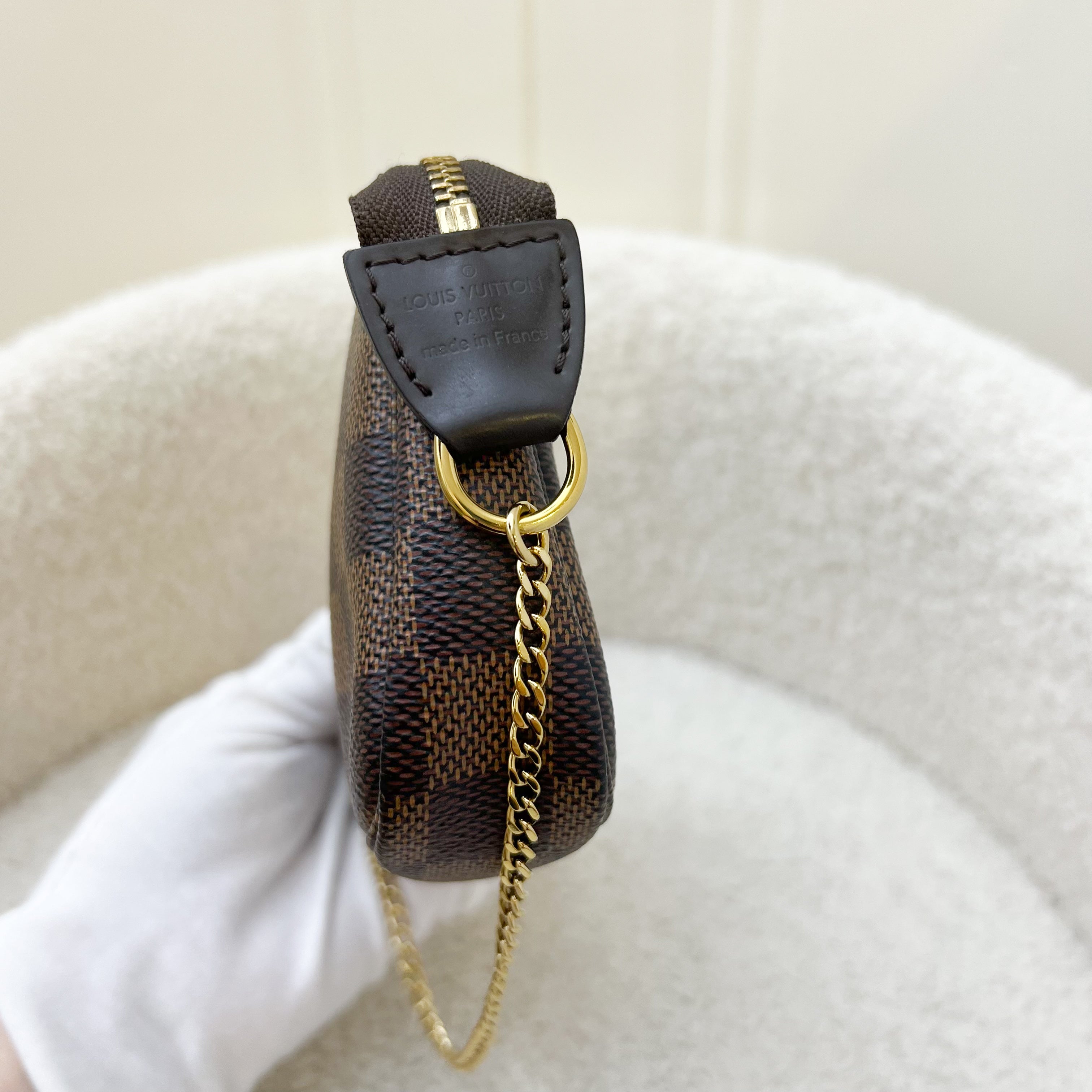 LV Mini Pochette Accessoires in Damier Ebene Canvas GHW