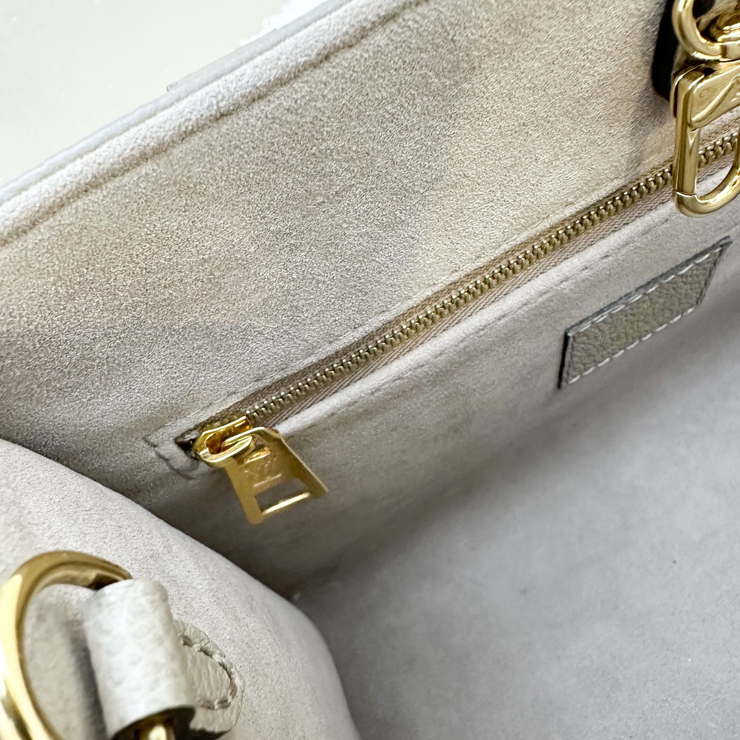 LV Onthego PM in Tourterelle (Grey) / Creme Giant Monogram Empreinte Leather and GHW