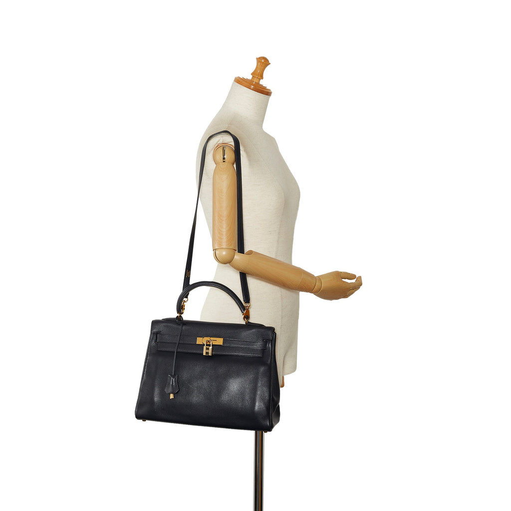 HermÃƒÆ’Ã‚Â¨s Kelly 32 Black Evercolor Clemence Gold