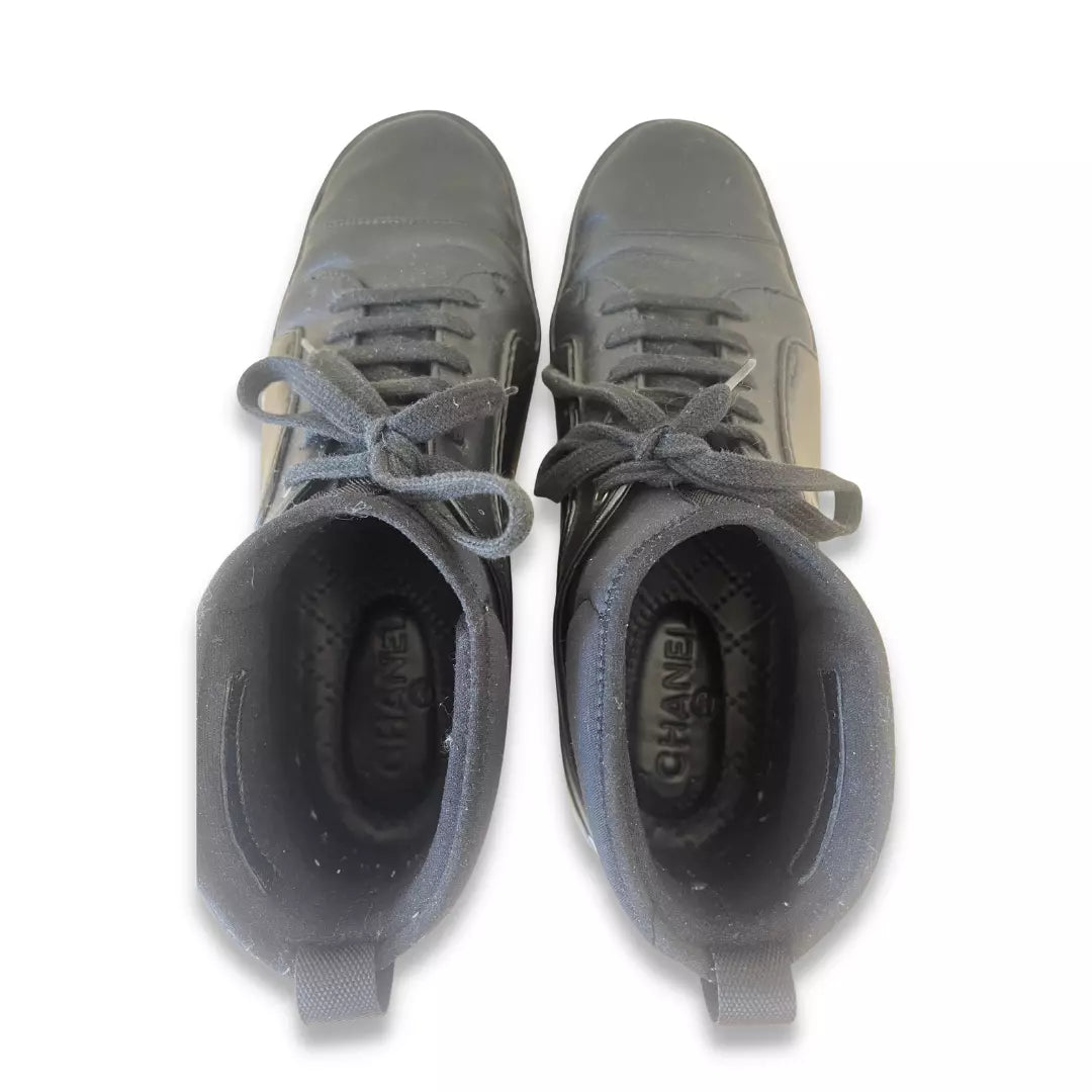 CHANEL BLACK RUBBER AND LEATHER CC SNEAKERS