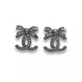 CHANEL SILVER CC CRYSTAL & RIBBONS EARRINGS