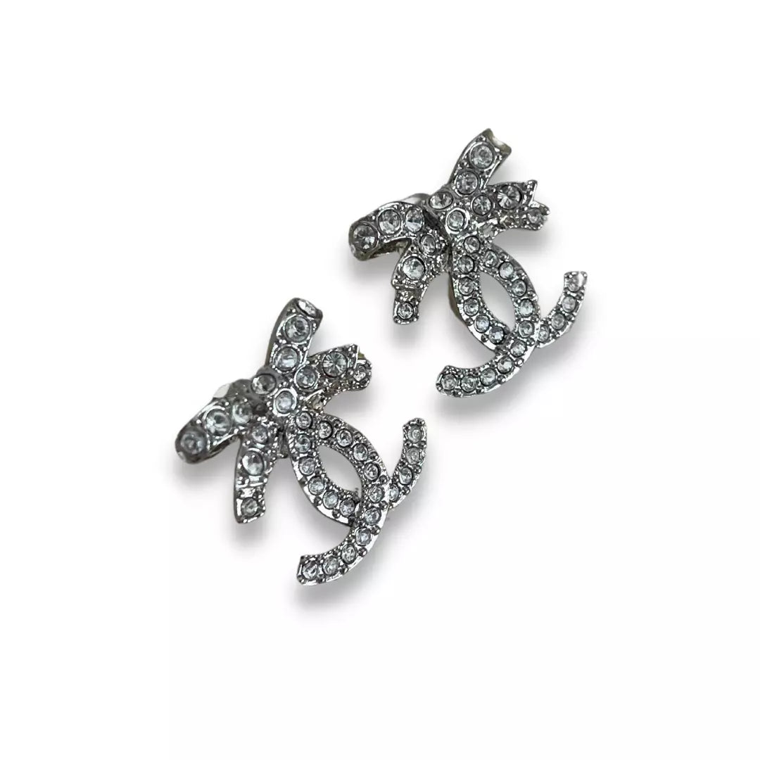 CHANEL SILVER CC CRYSTAL & RIBBONS EARRINGS