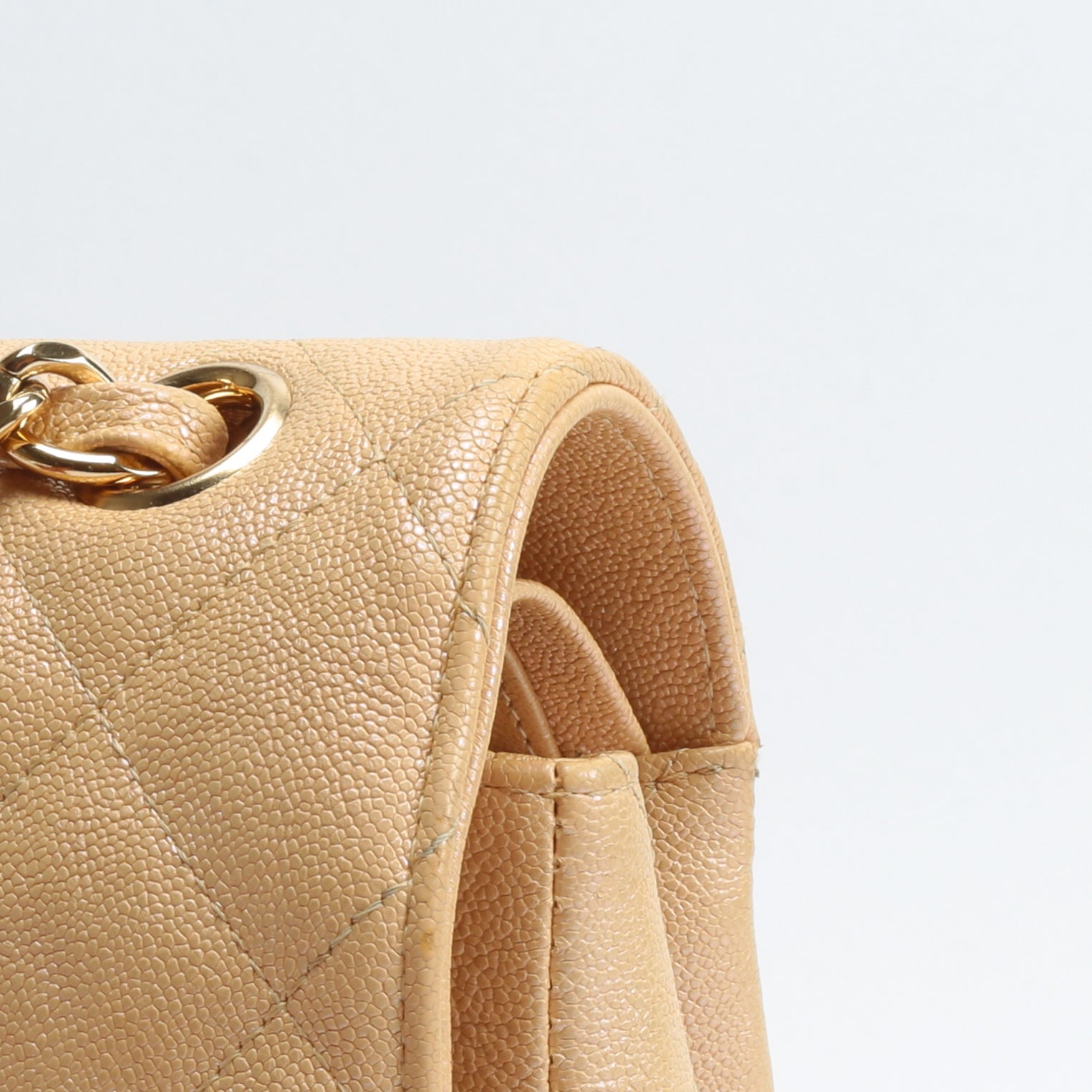CHANEL Jumbo Quilted Double Flap Caviar Beige Iridescent