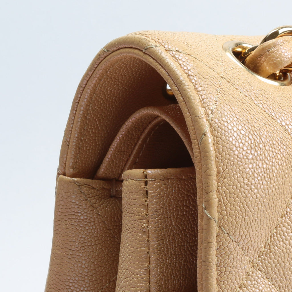 CHANEL Jumbo Quilted Double Flap Caviar Beige Iridescent