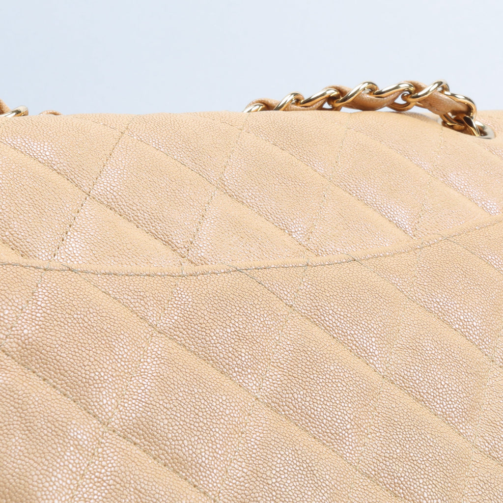 CHANEL Jumbo Quilted Double Flap Caviar Beige Iridescent