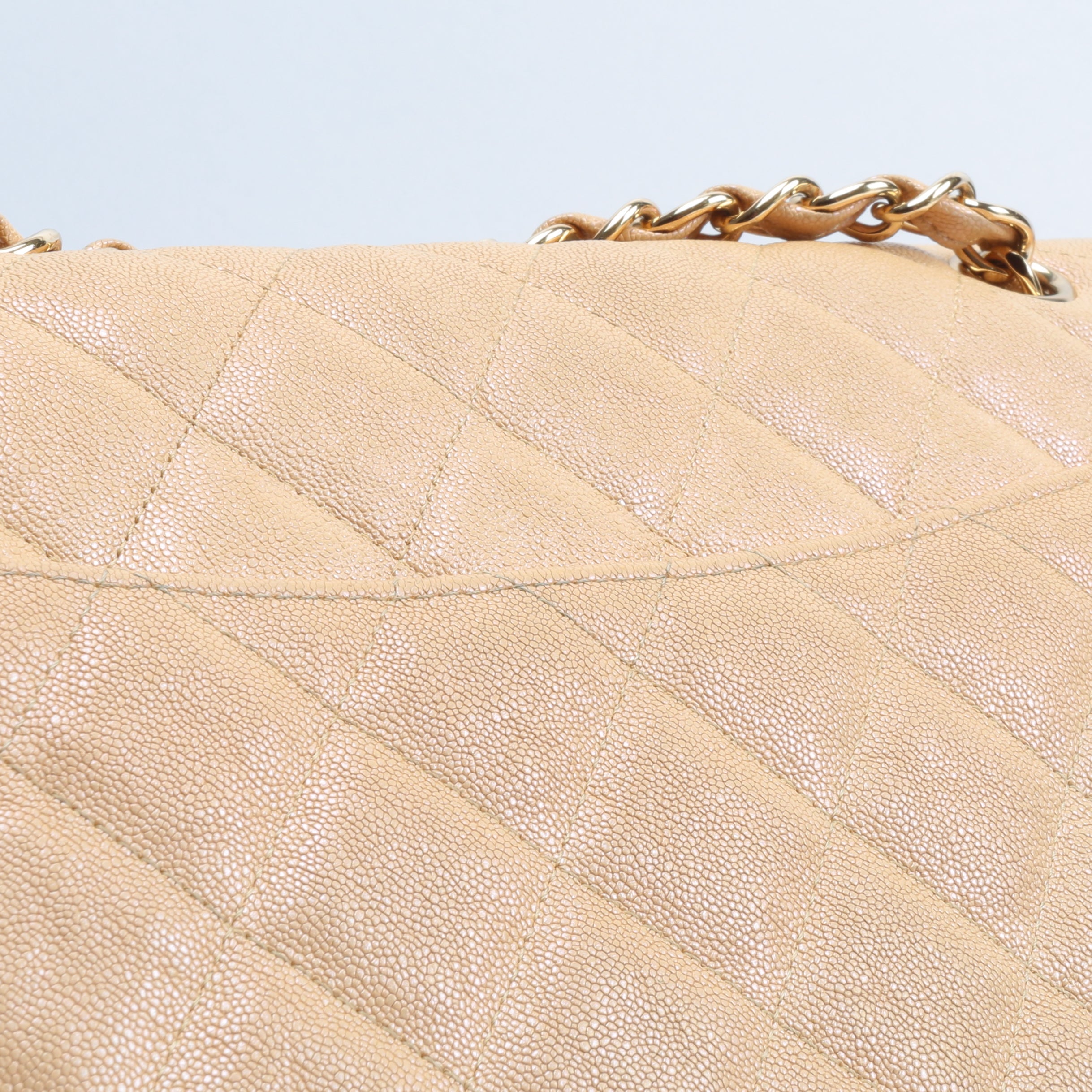 CHANEL Jumbo Quilted Double Flap Caviar Beige Iridescent