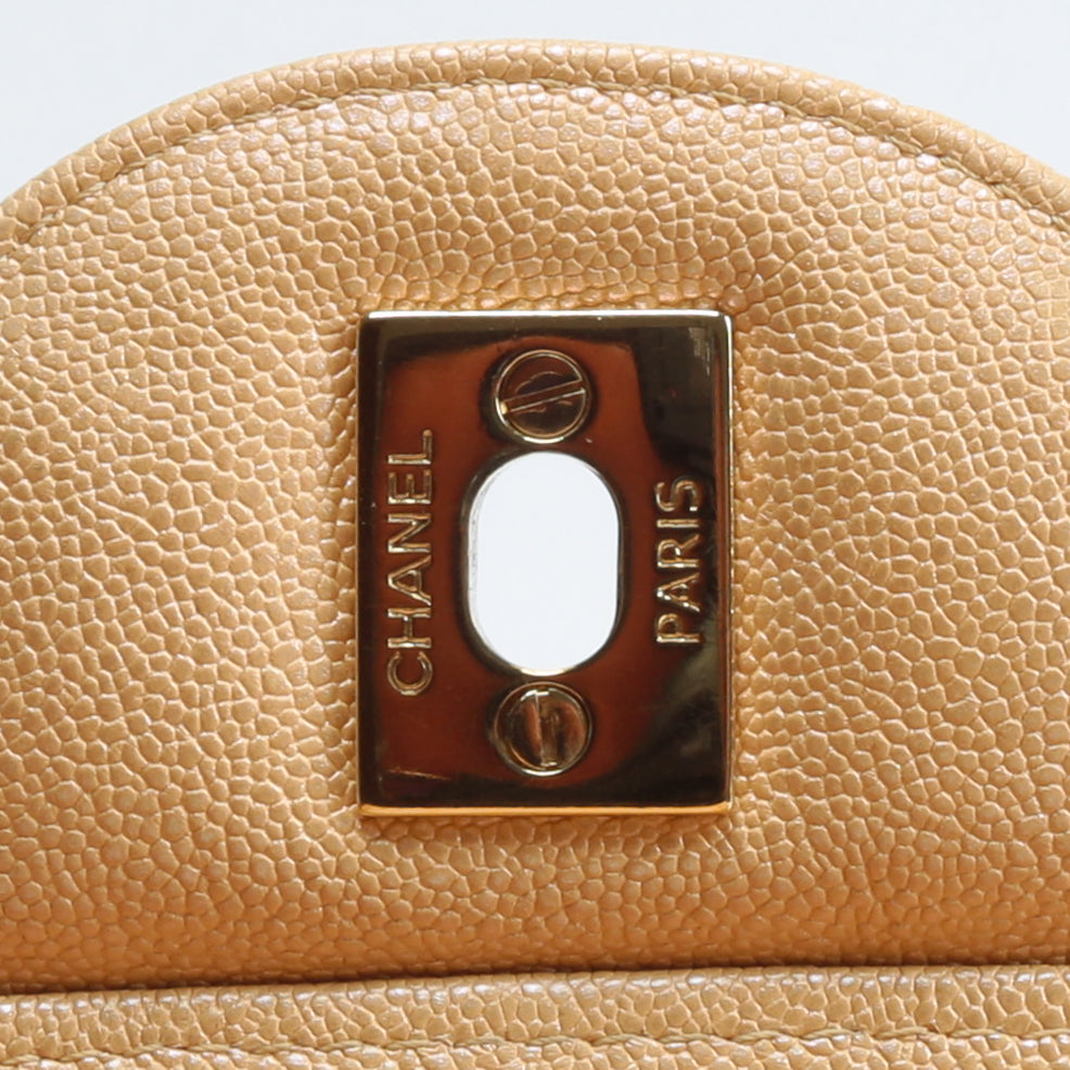 CHANEL Jumbo Quilted Double Flap Caviar Beige Iridescent