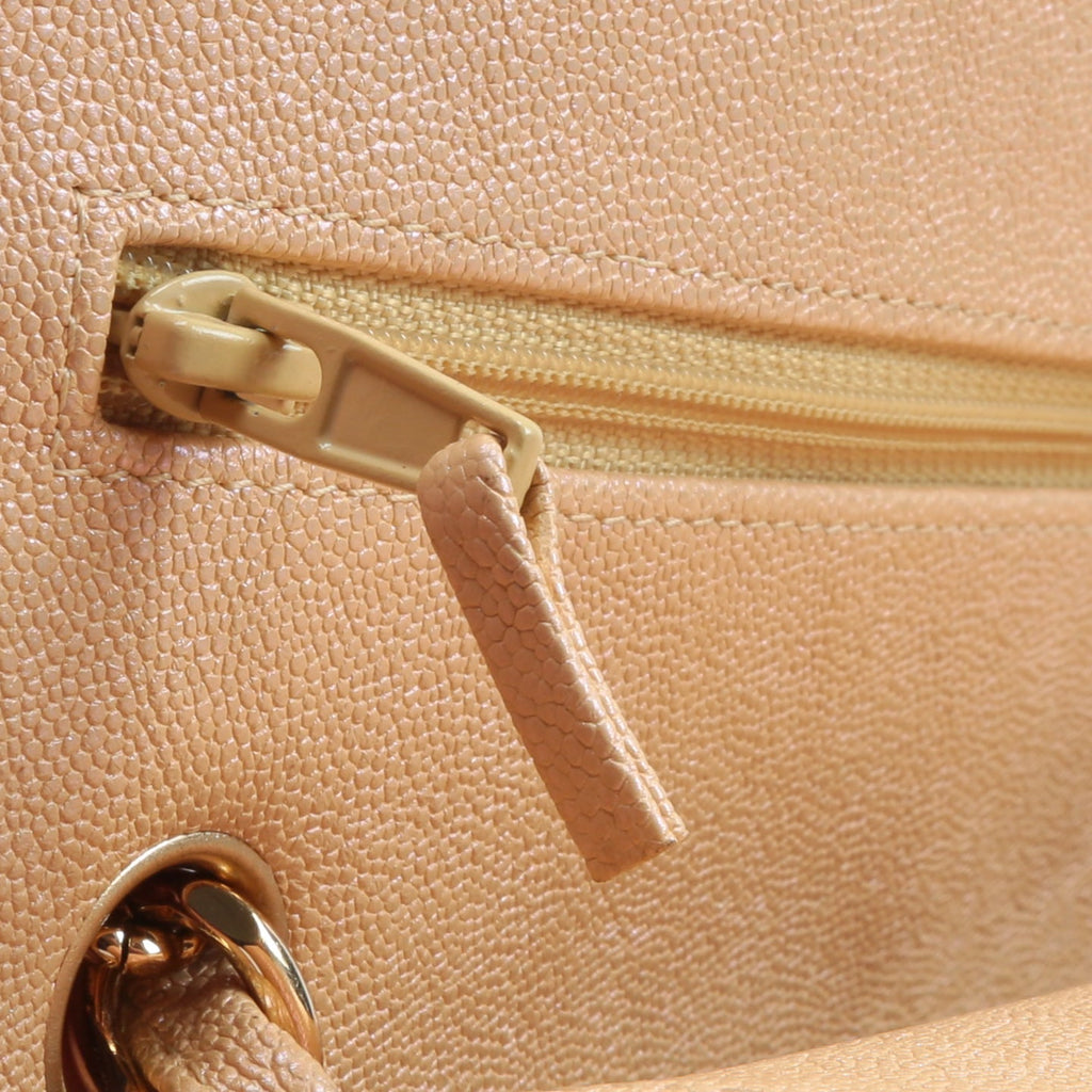 CHANEL Jumbo Quilted Double Flap Caviar Beige Iridescent