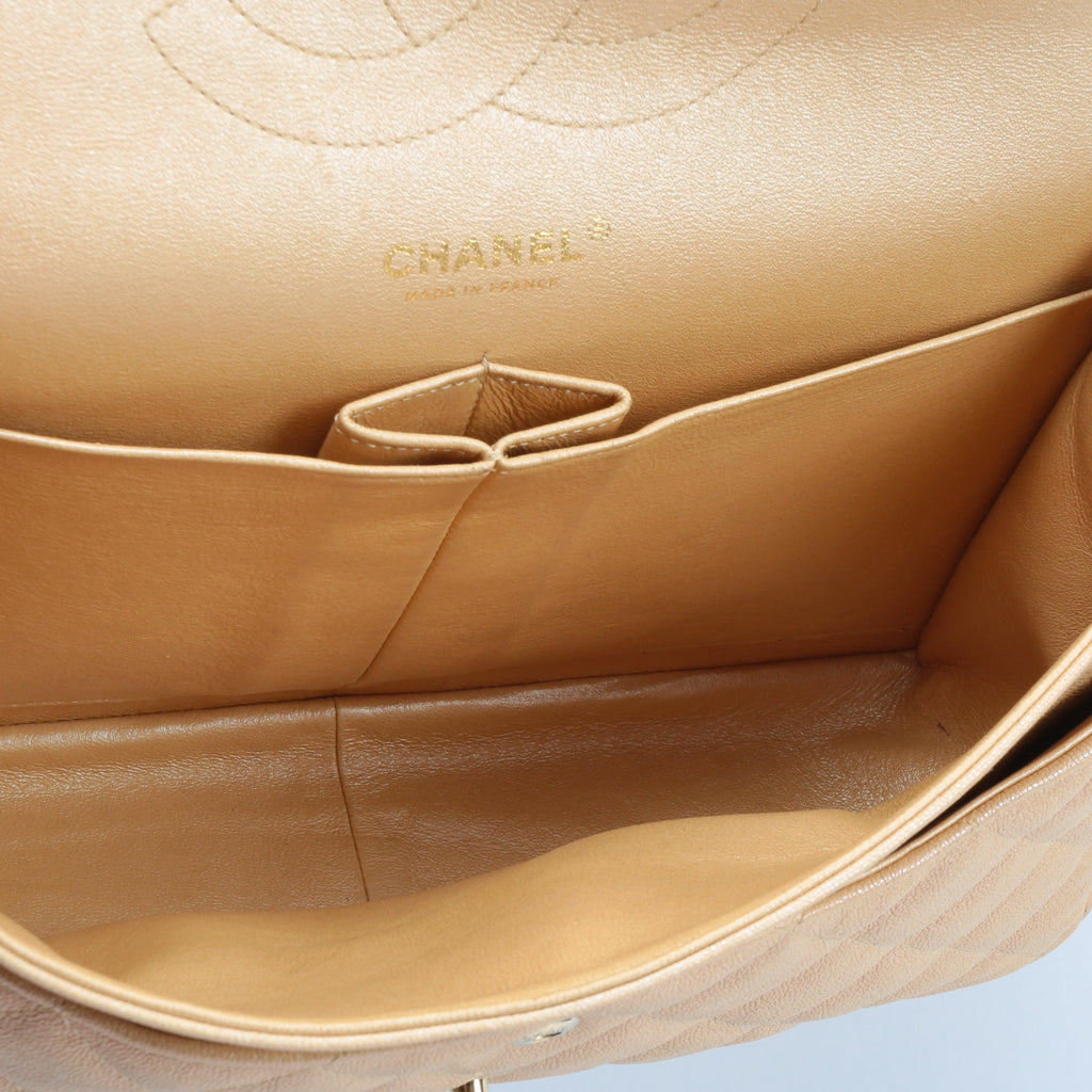 CHANEL Jumbo Quilted Double Flap Caviar Beige Iridescent
