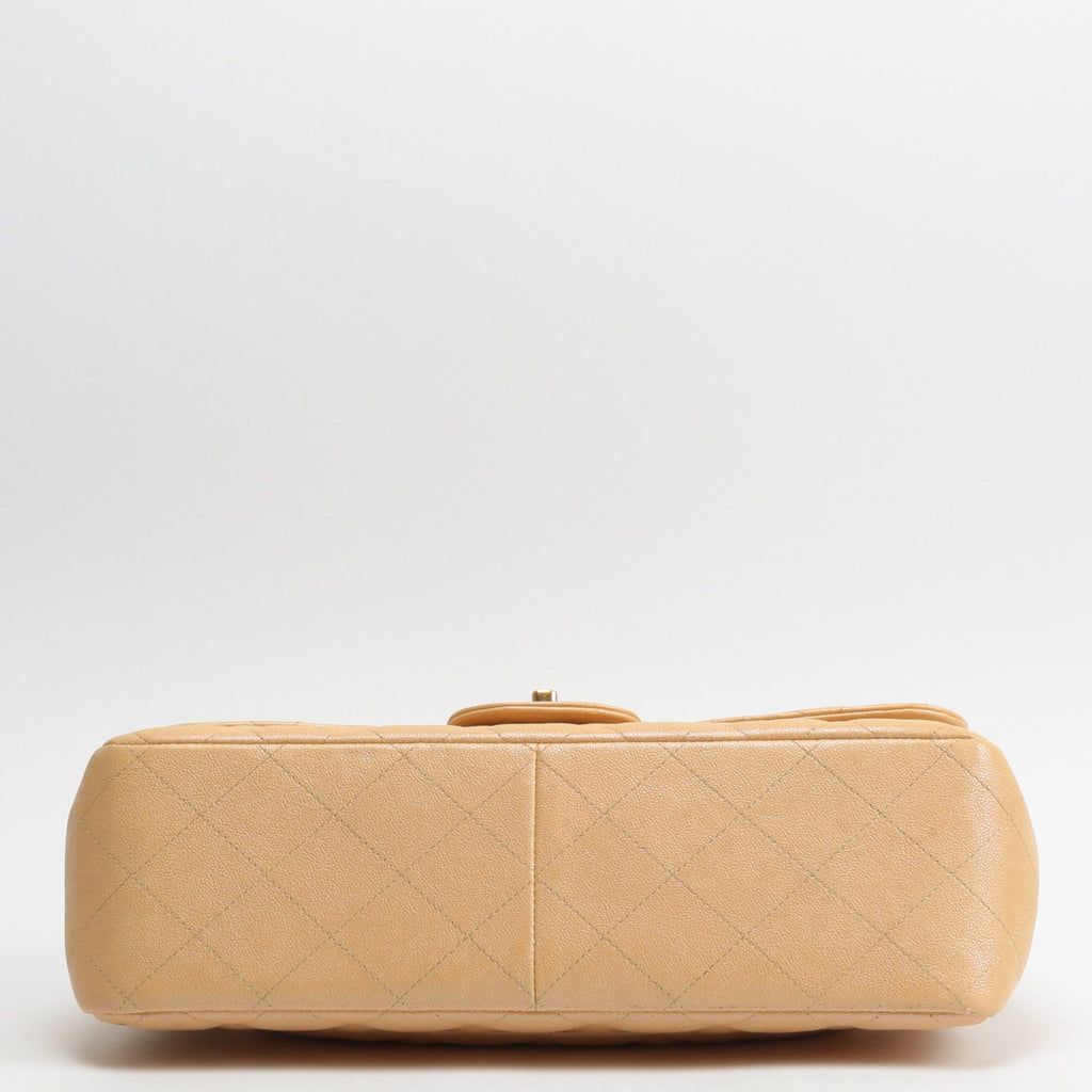 CHANEL Jumbo Quilted Double Flap Caviar Beige Iridescent