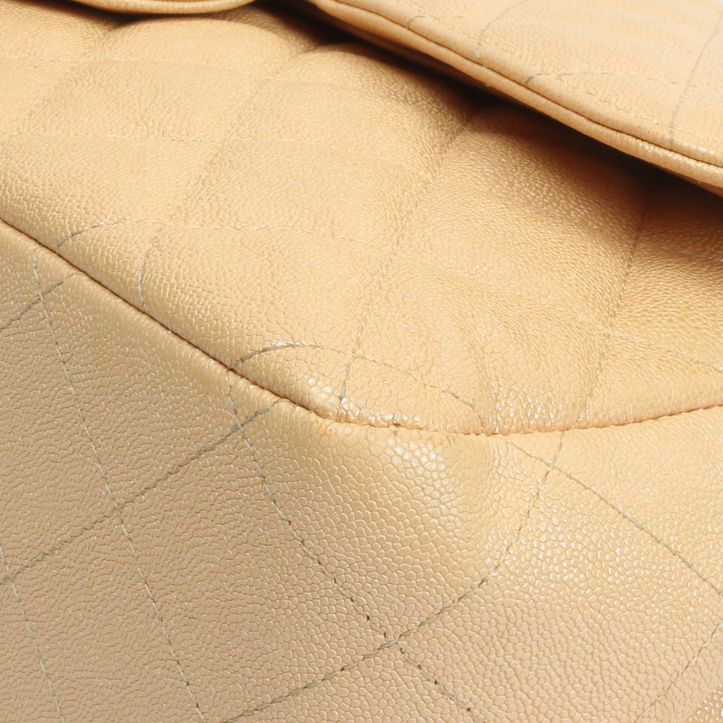 CHANEL Jumbo Quilted Double Flap Caviar Beige Iridescent