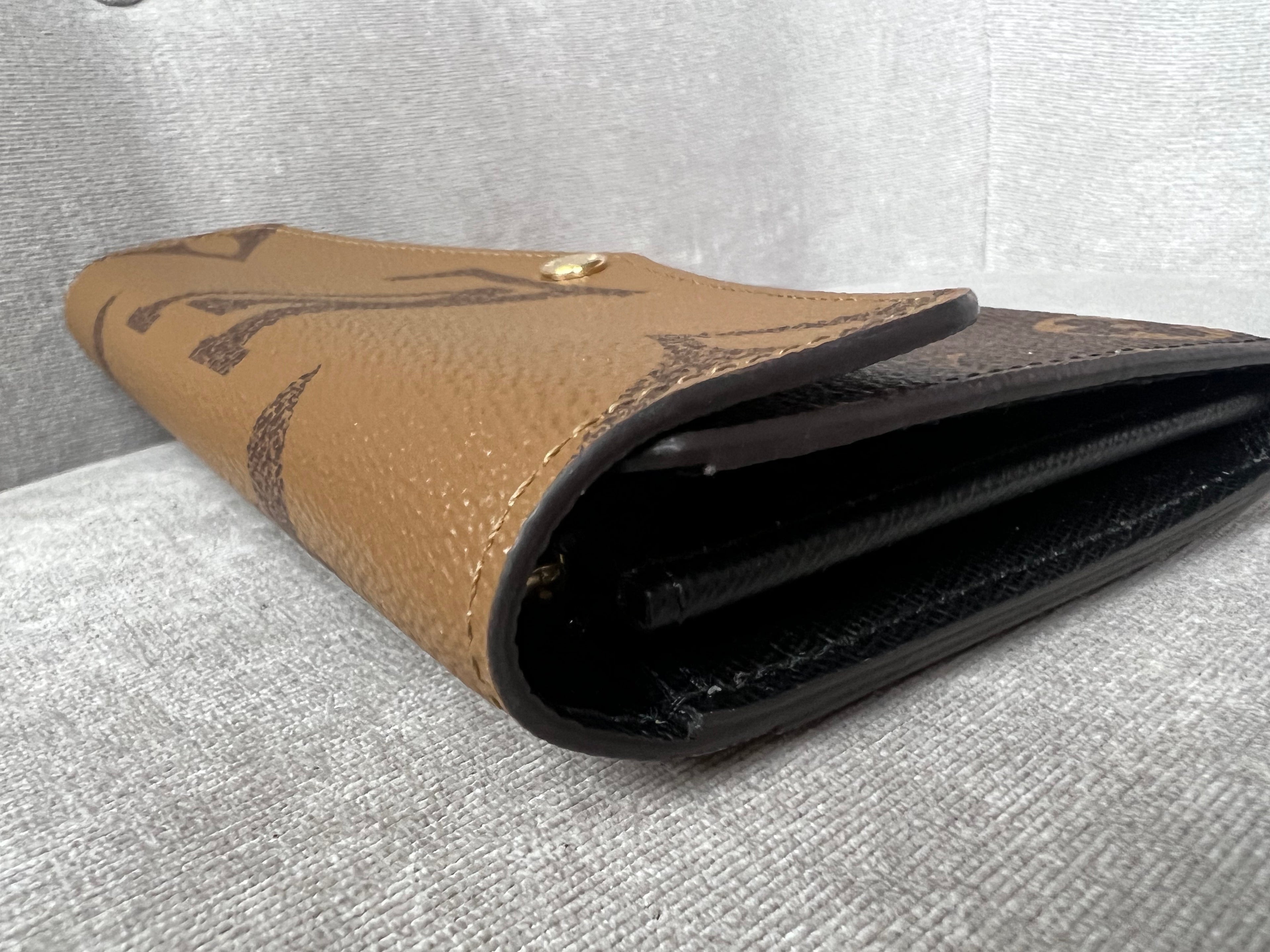 Louis Vuitton Sarah Wallet in reverse Monogram and Brown (RRP £550)