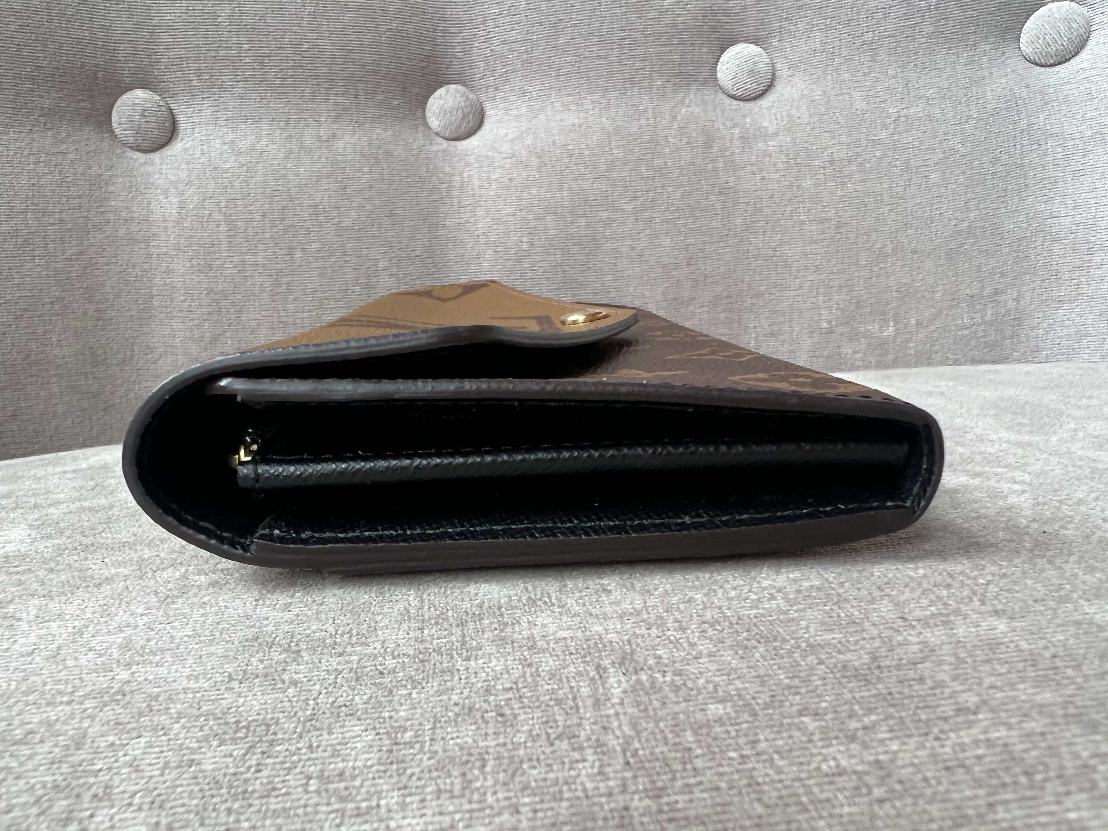 Louis Vuitton Sarah Wallet in reverse Monogram and Brown (RRP £550)