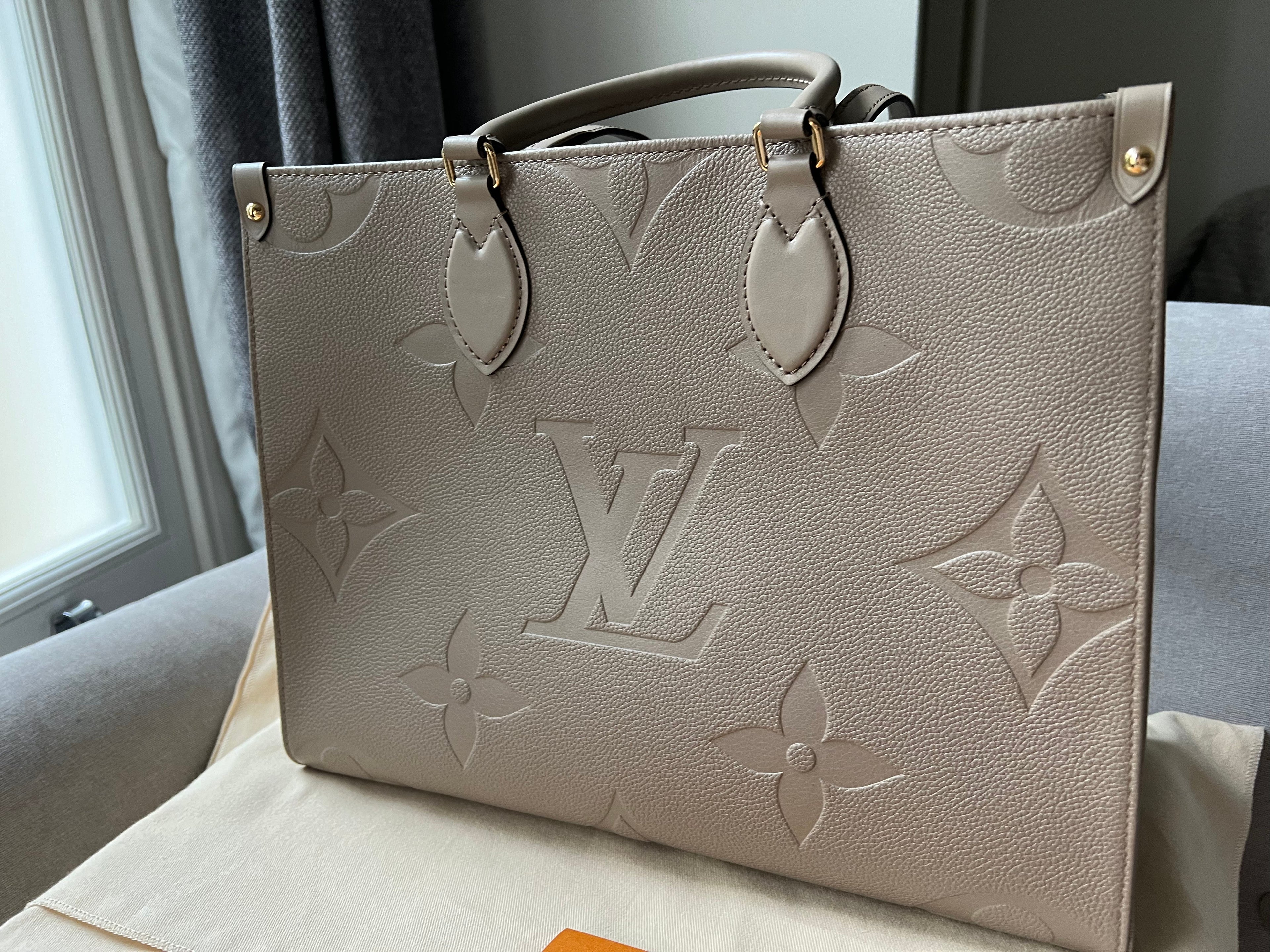 Louis Vuitton On the Go MM Dune Empreinte (RRP £2,480)