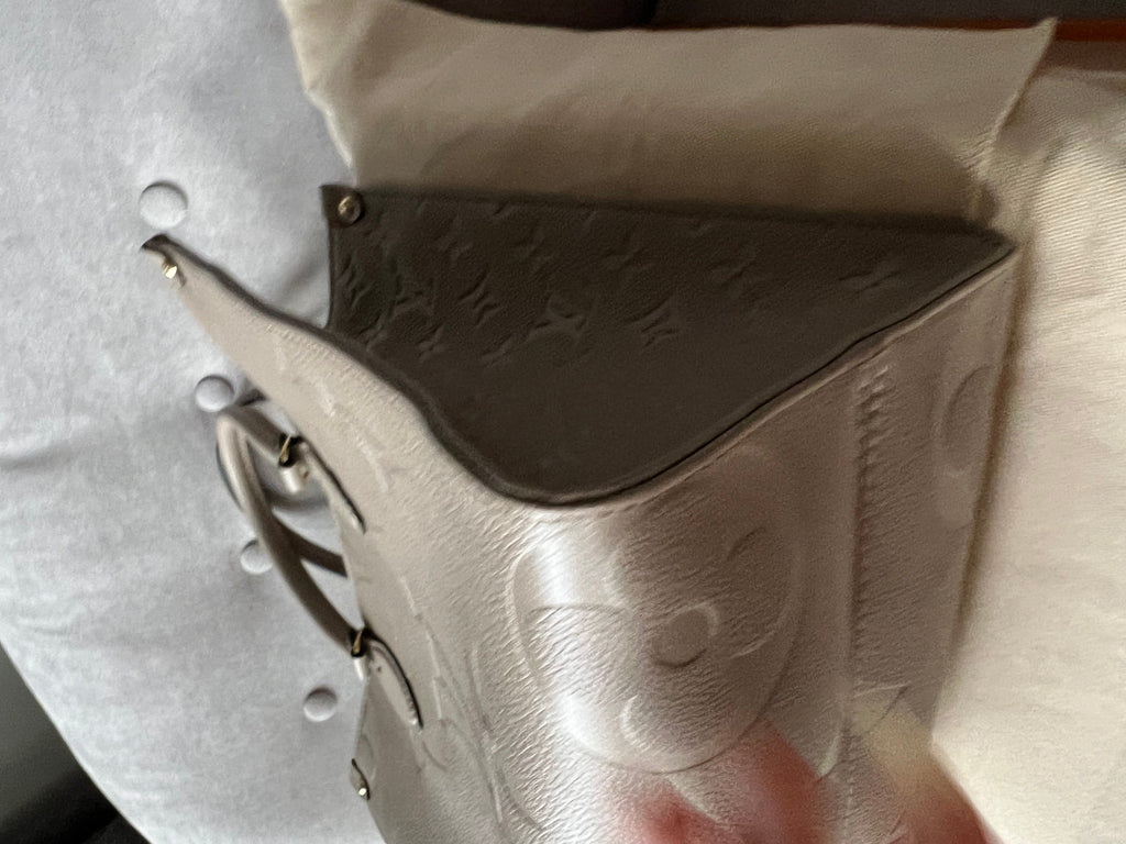 Louis Vuitton On the Go MM Dune Empreinte (RRP £2,480)