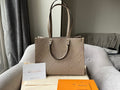 Louis Vuitton On the Go MM Dune Empreinte (RRP £2,480)