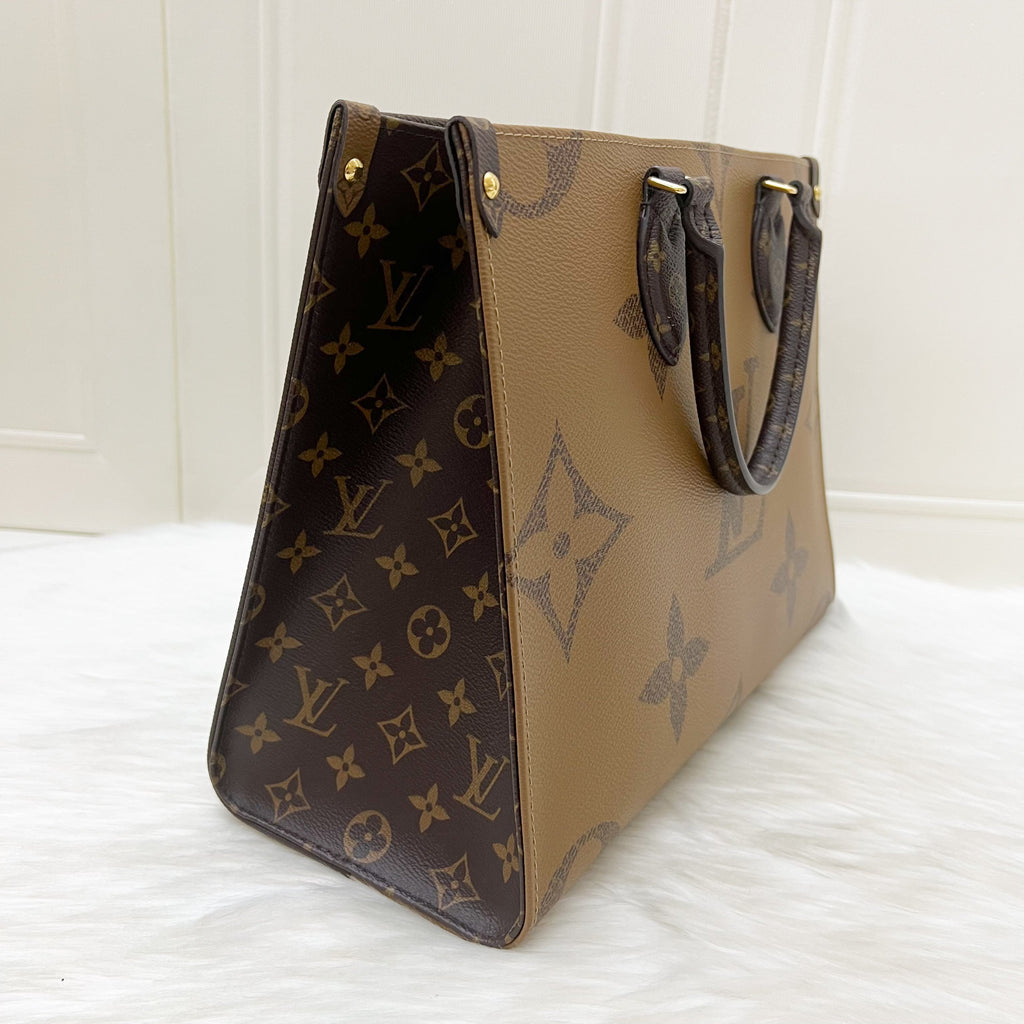 LV Onthego MM in Reverse Giant Monogram Canvas and GHW
