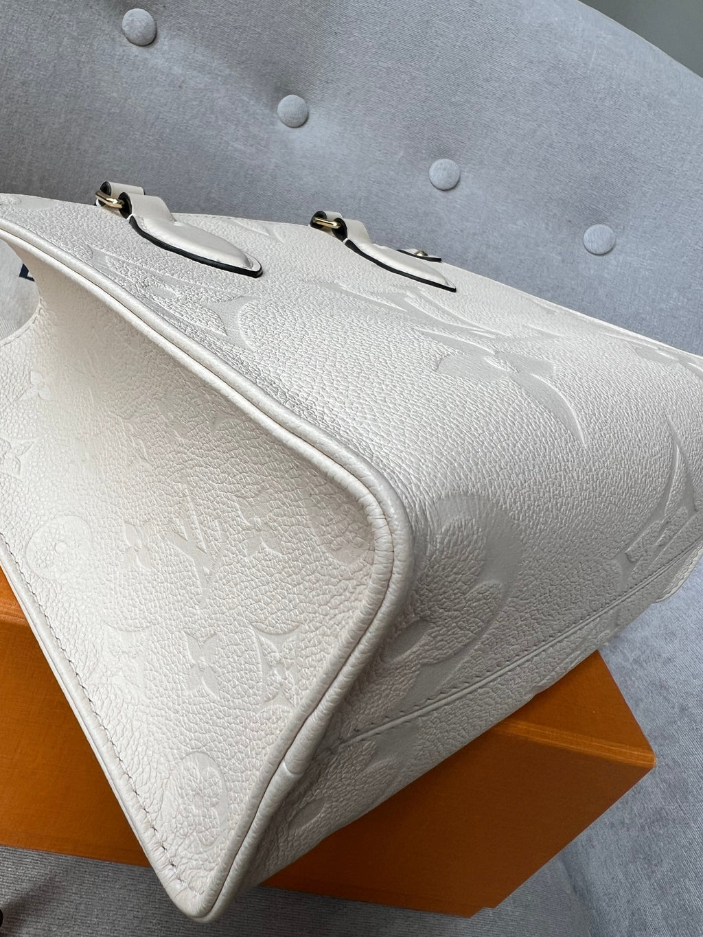 Louis Vuitton On the Go Crème PM Empreinte (RRP £2,380)