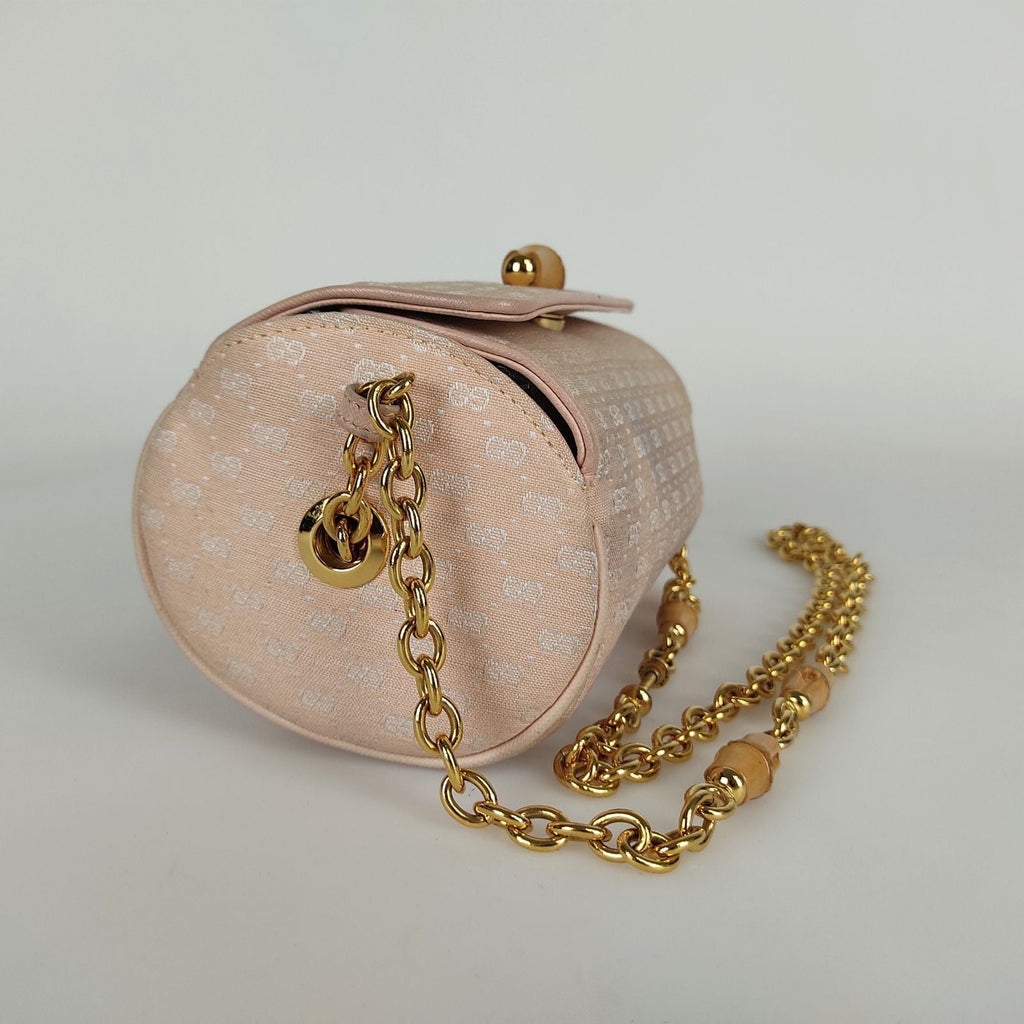 Gucci Gucci vintage Bamboo shoulder bag in pink GG canvas - '10s