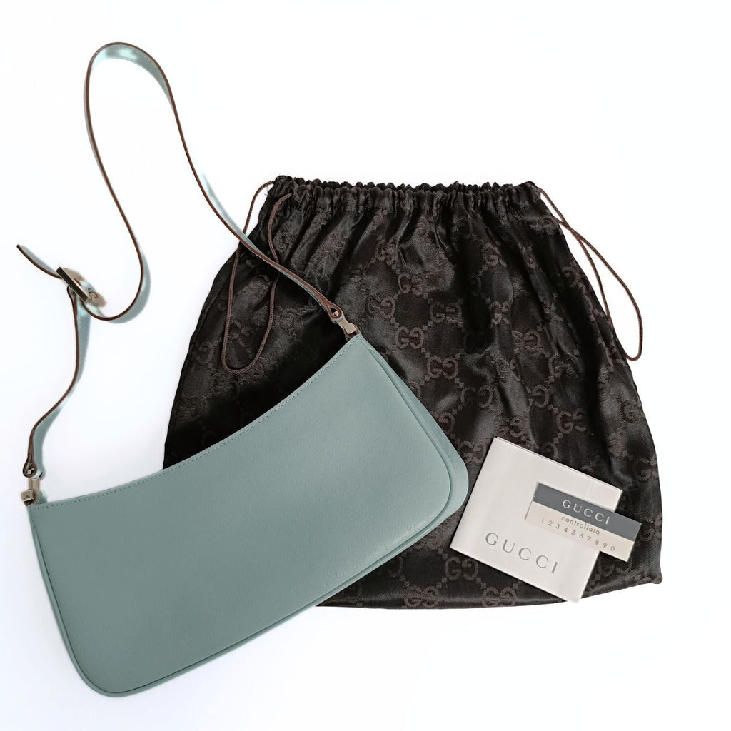 Gucci Gucci baguette shoulder bag in powder blue GG leather - '10s