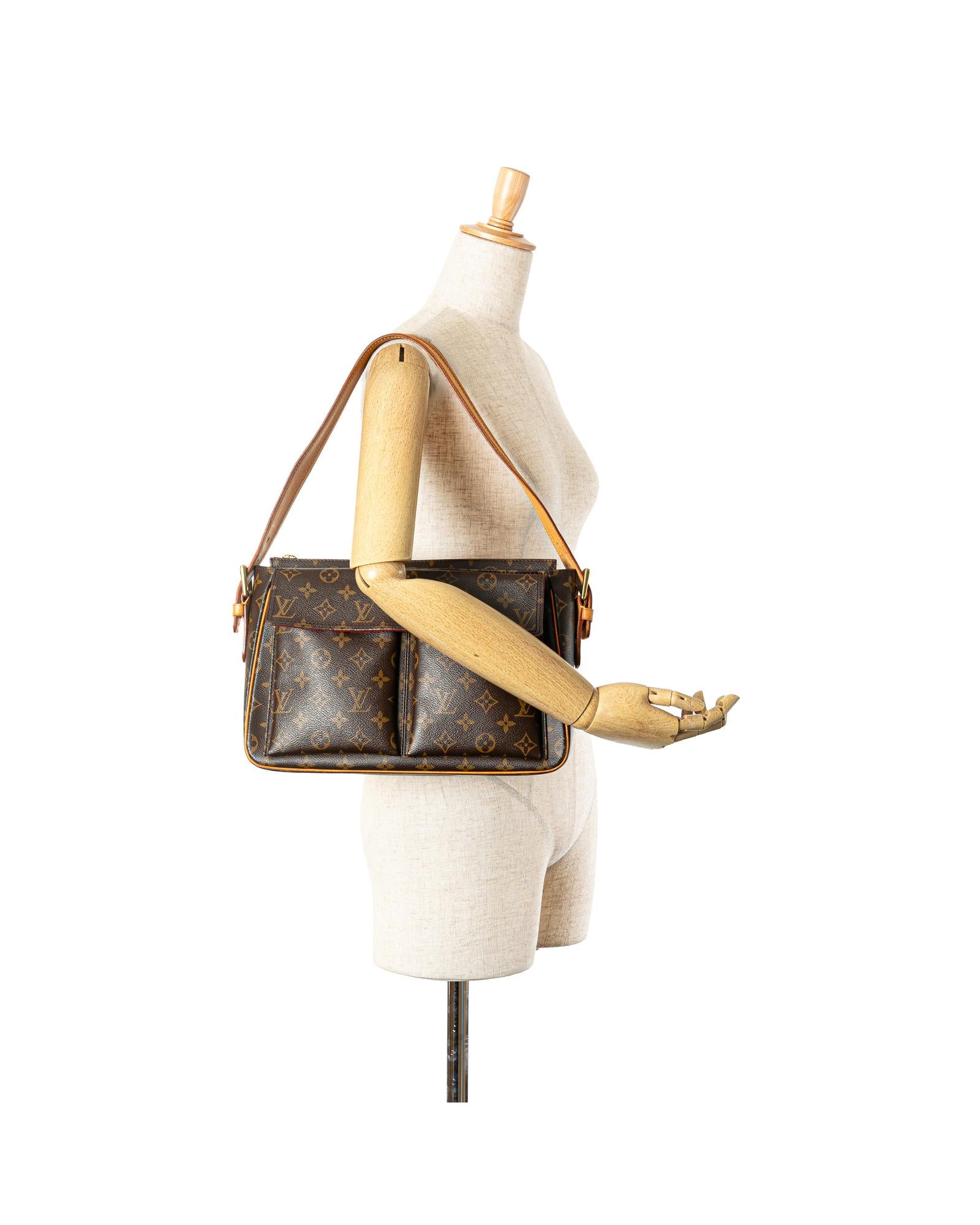 Monogram Canvas Shoulder Bag with Adjustable Strap and Multiple Pockets