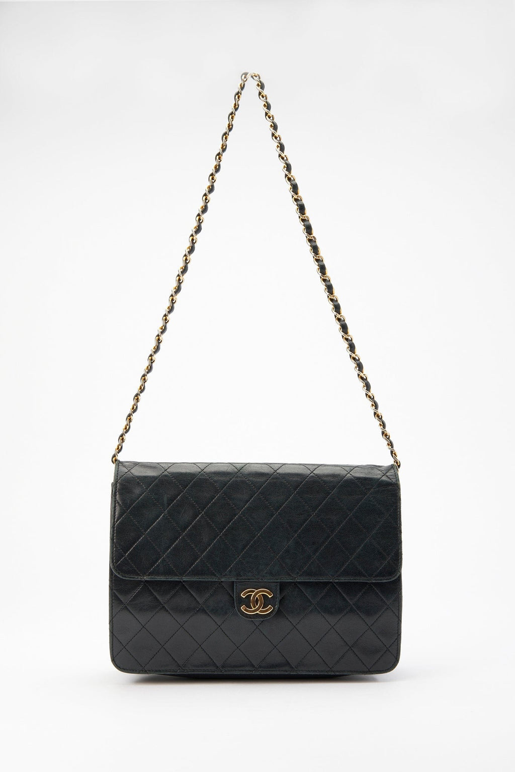 Vintage Black Chanel Flap Bag with 24K Plated Hardware